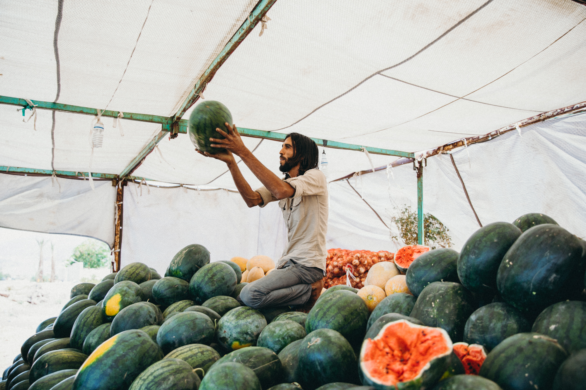 We came to this fruit stand and met tons of locals there! They were kind enough to share watermelon with us and wanted lots of photos of us on their phones!