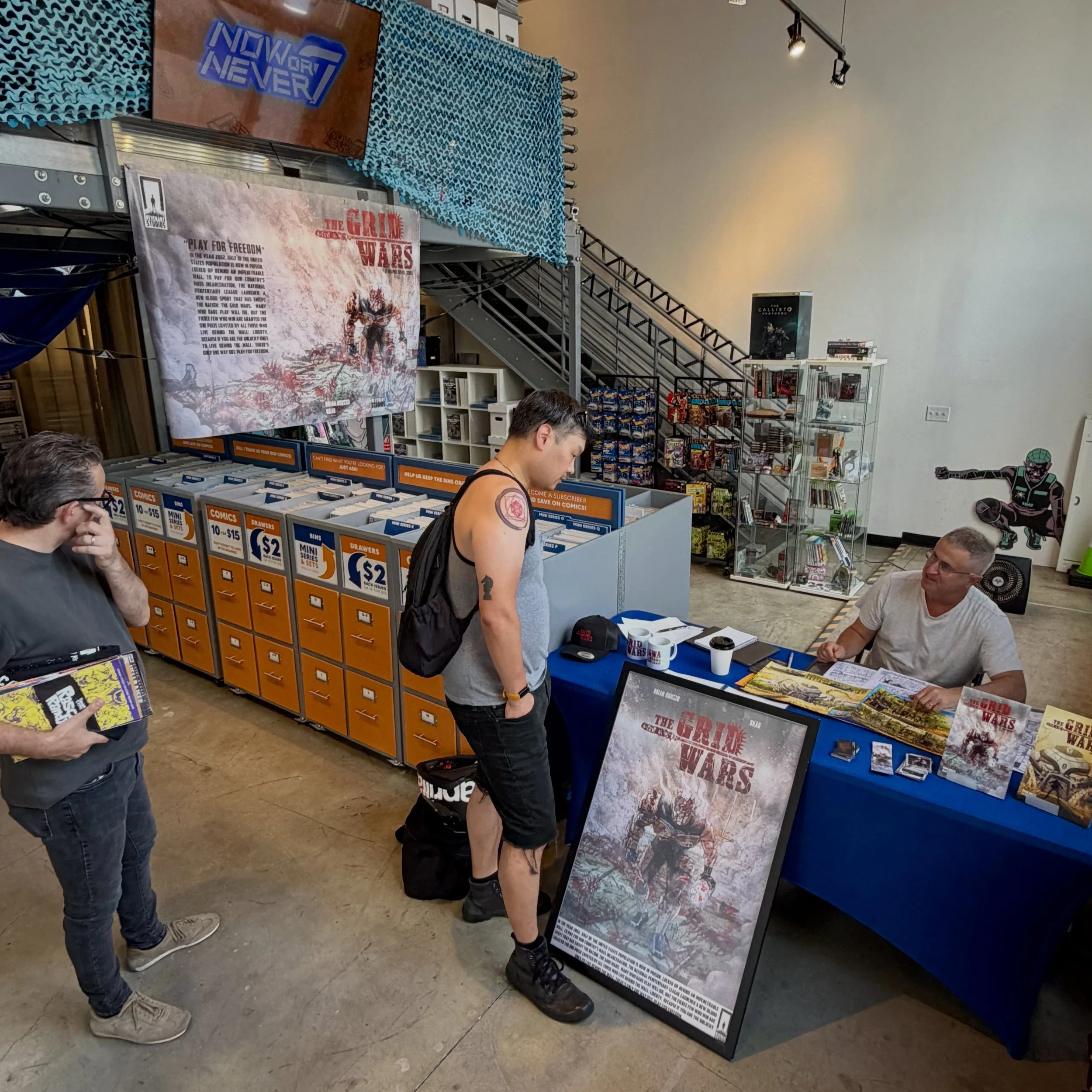 We&rsquo;ve got @revenantrousso in the shop until 4pm! He&rsquo;s selling and signing copies of his book Grid Wars, a gritty sci fi story for fans of Rollerball and Running Man. Come by and hang out, support local creators!
