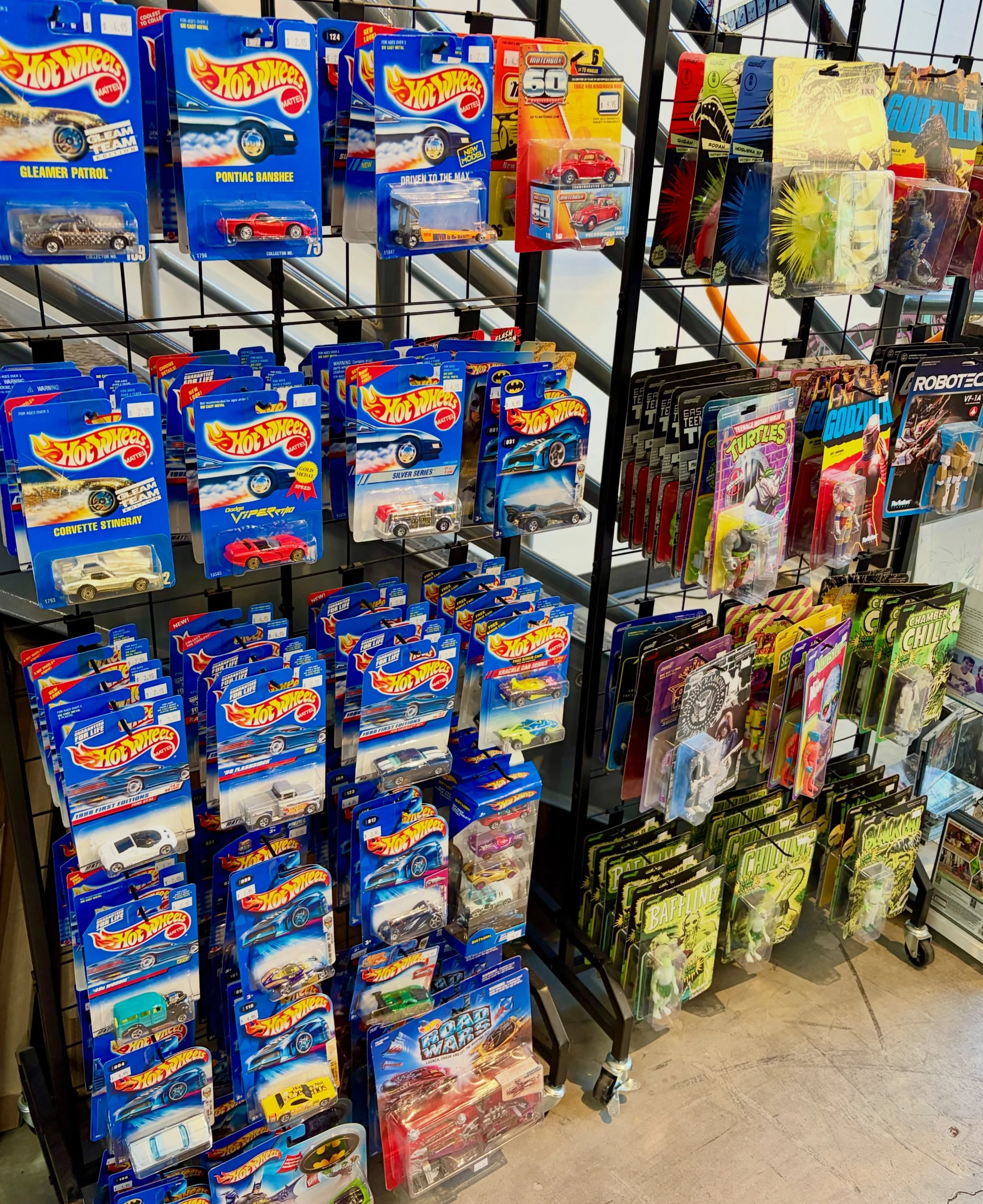 We, uh, accidentally acquired hundreds of Hot Wheels, so there&rsquo;s a brand new diecast display in the shop! All from the early to mid &lsquo;90s. So many cars that the display rack fell over the first time we set it up. Almost all just $3-5 each,