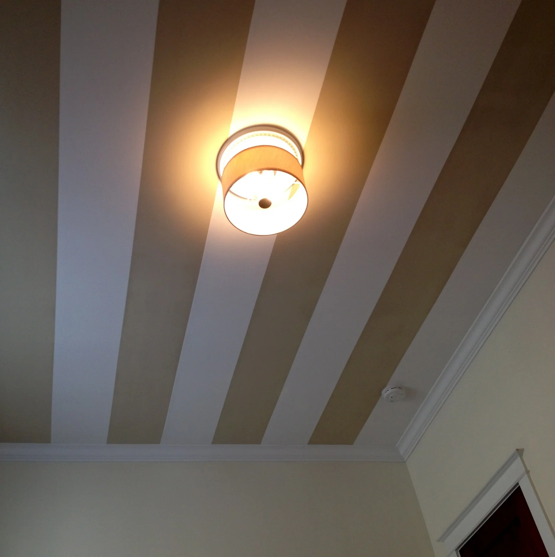  Instead of covering walls in this very small nursery room which would be overwhelming I painted the ceiling. Very simple but effective approach to this small room. 