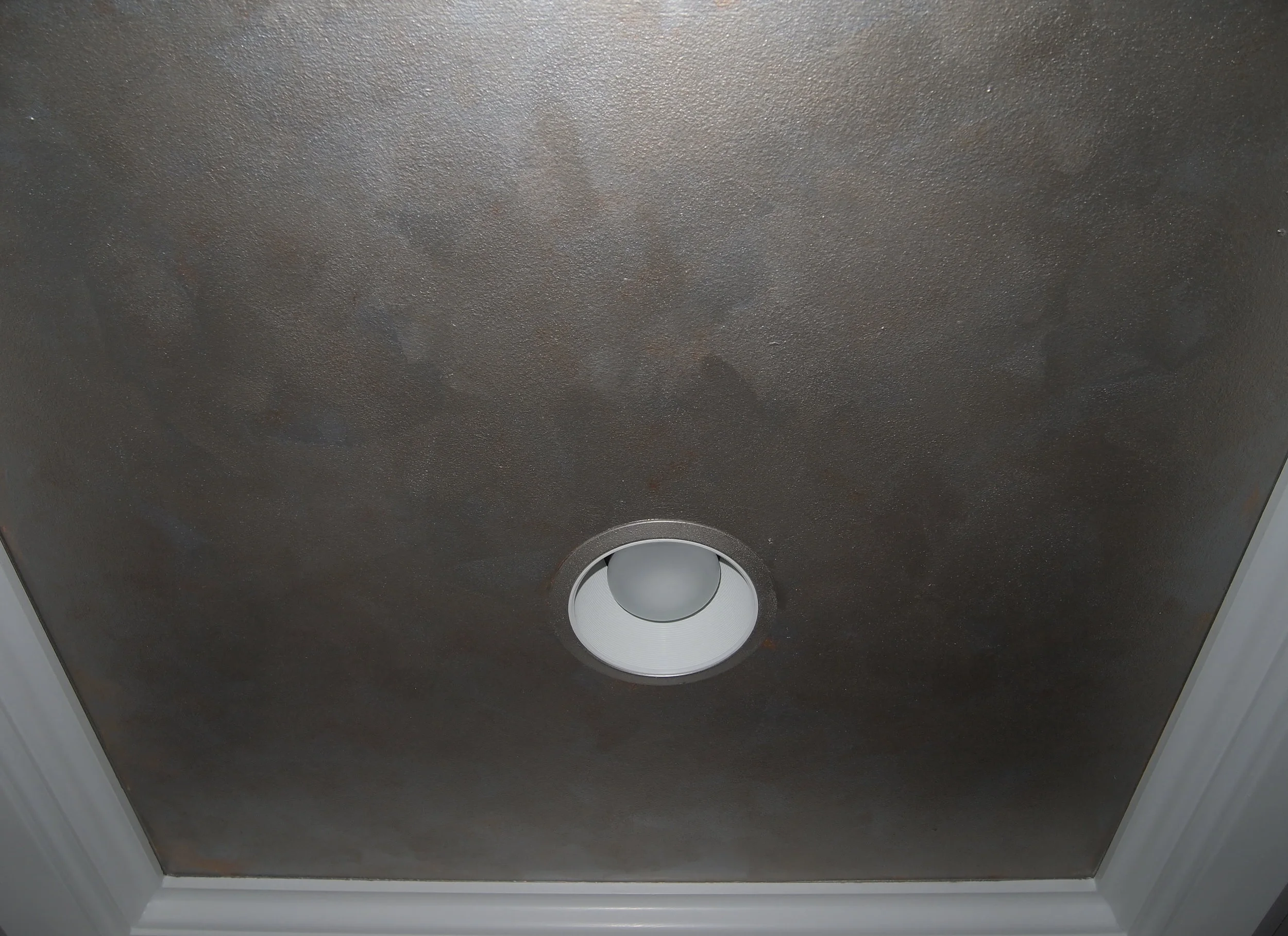  This is a close-up of metallic faux from the previous picture. Each of nine panels received the same treatment. I used three different metallic colors and combine them into one finish with rag off technique. 