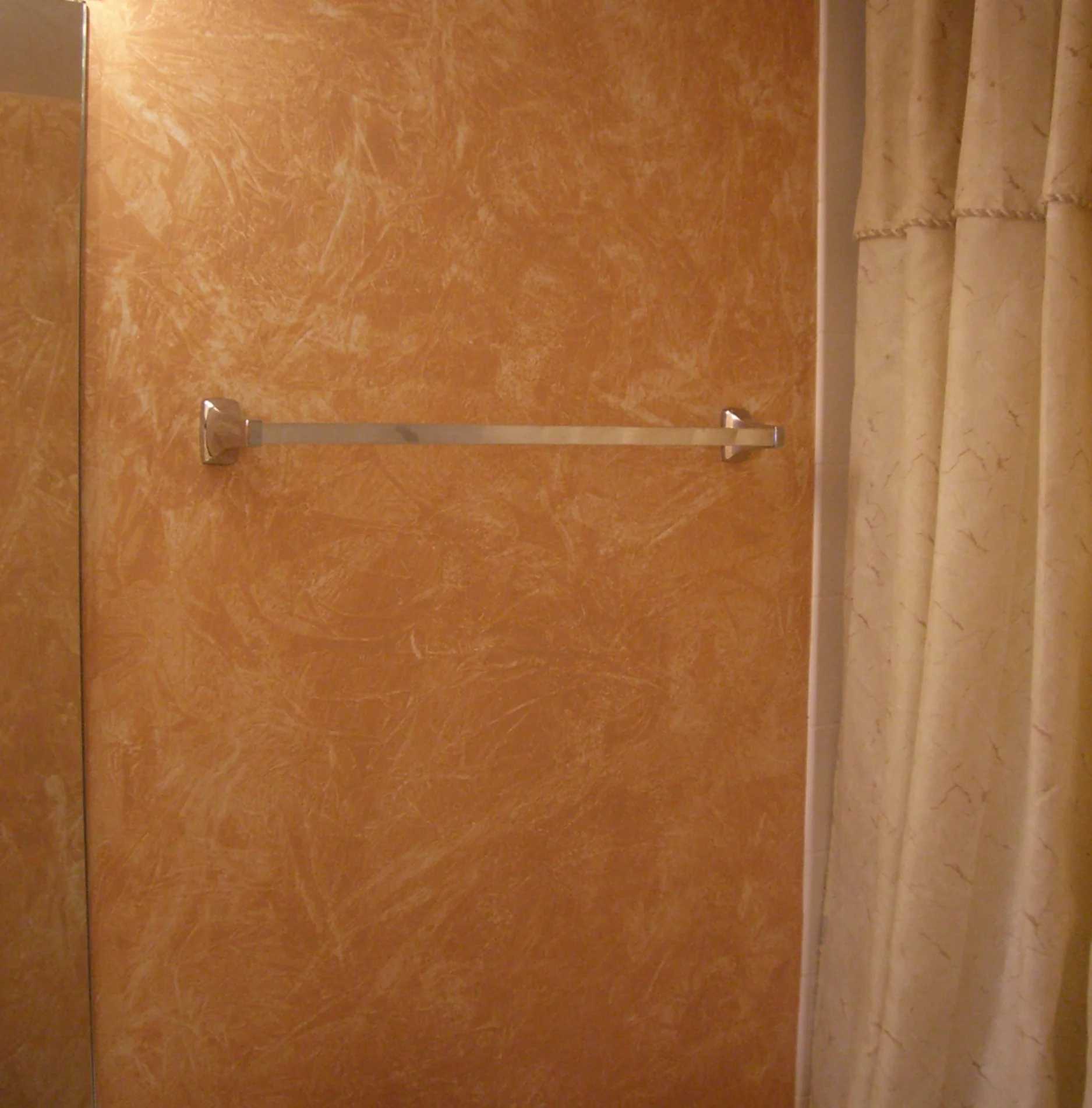  Here is an example of an improvement done by adding a faux finish effect to the space. Here I used a frottage technique to create a dramatic and rich atmosphere. The final effect is softened by under-painting in warm tones and choosing a muted top-c