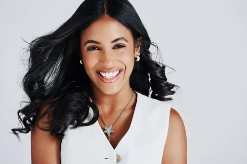 Corporate headshot, smiling