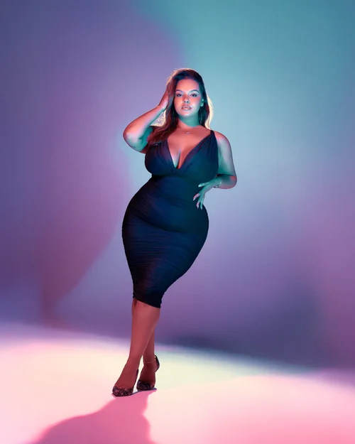 Navy dress under colored light