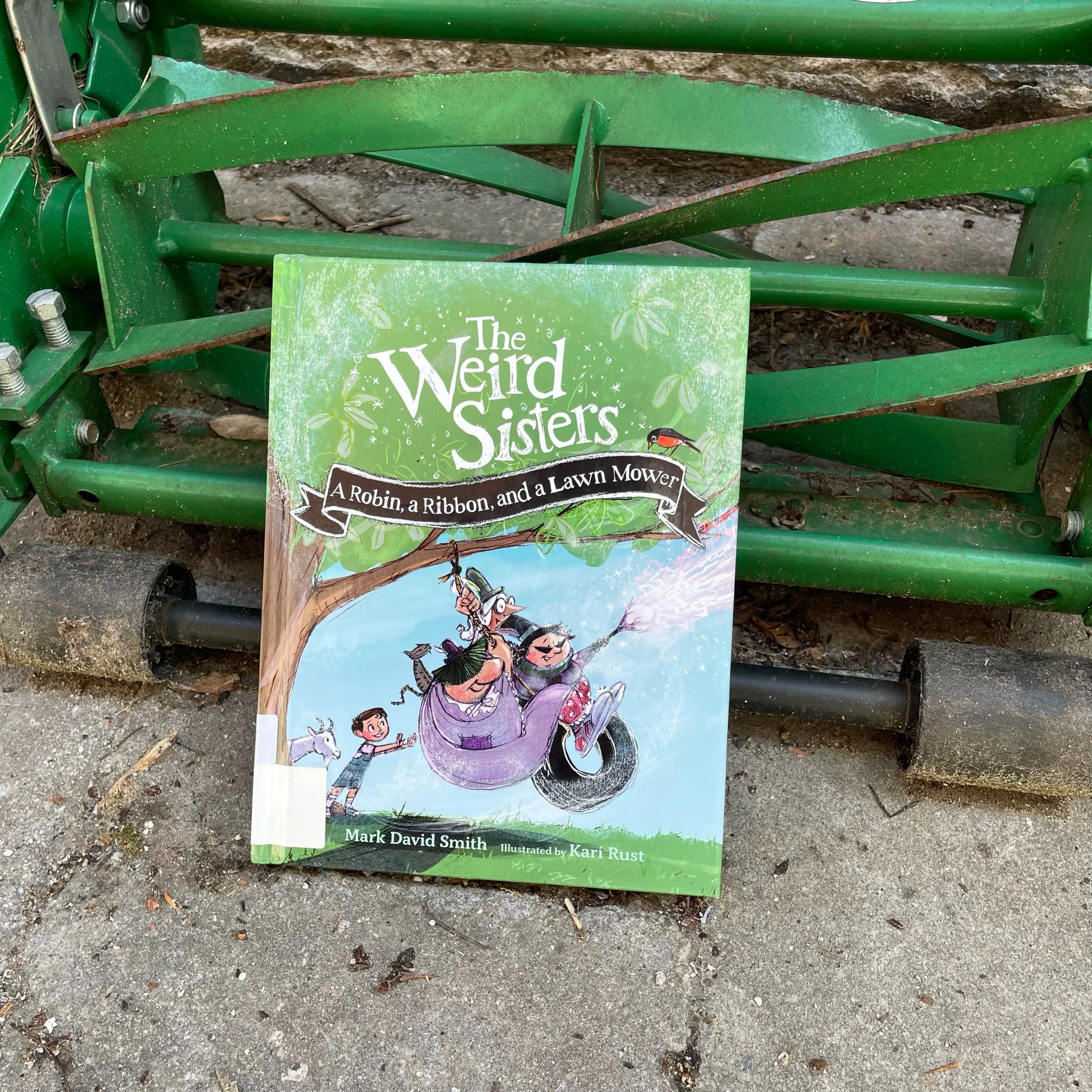 The Weird Sisters: A Robin, a Ribbon and a Lawn Mower