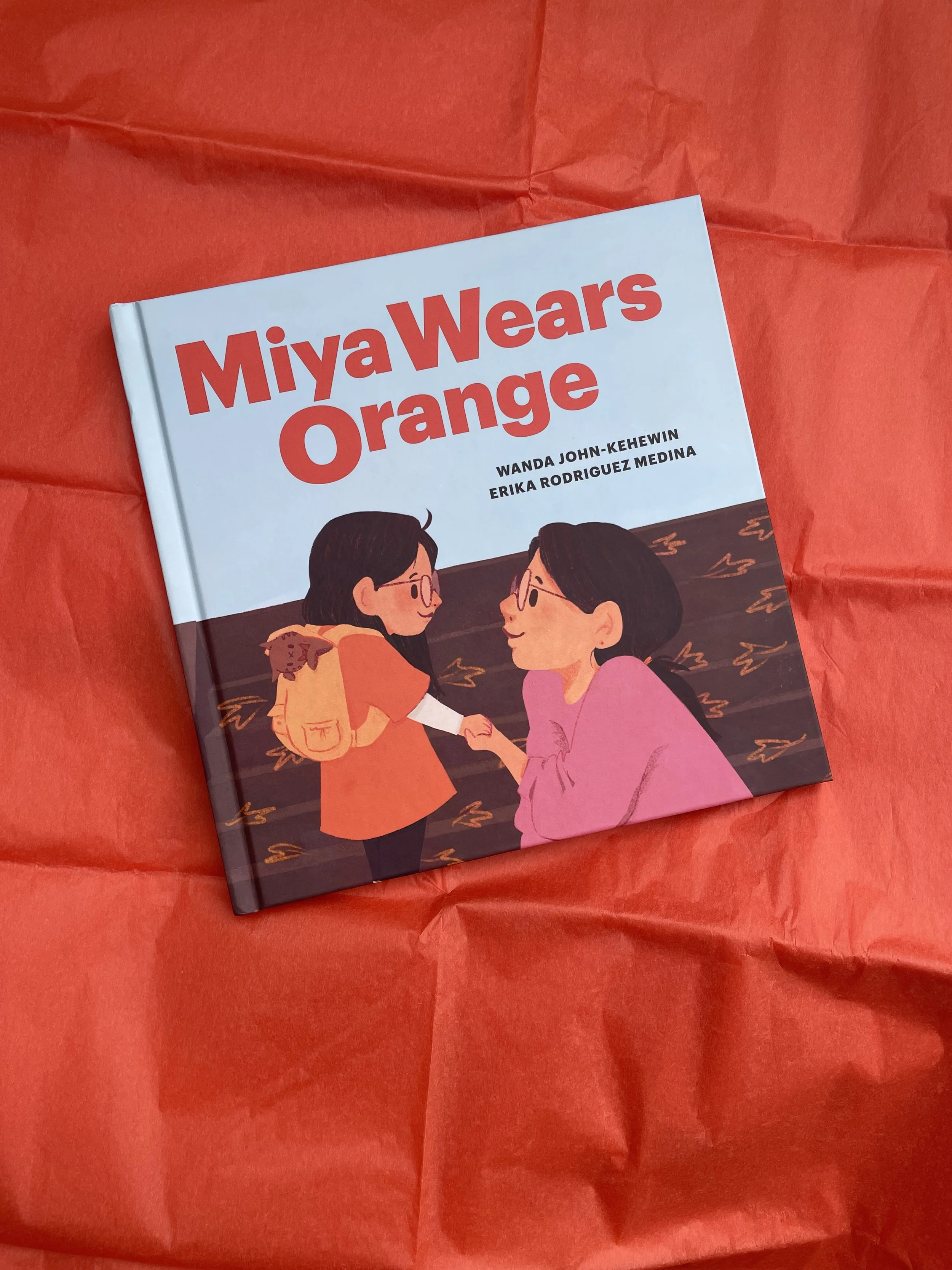 Miya Wears Orange