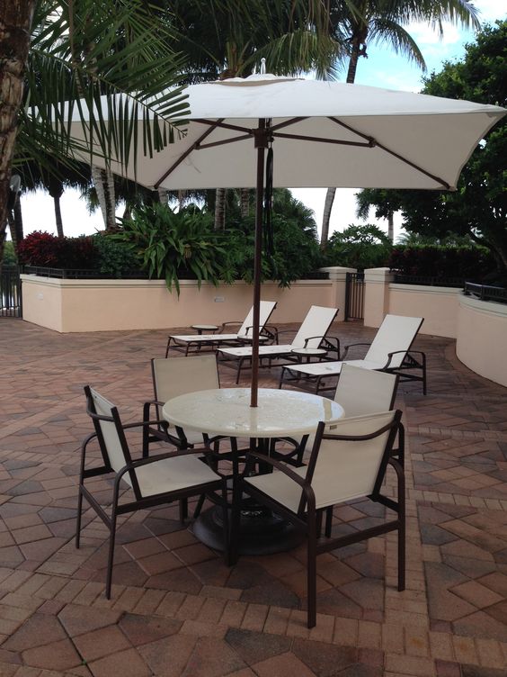  Pavilion's Portico Dining Sets and Chaise Lounges with TUUCI Plantation Parasols 