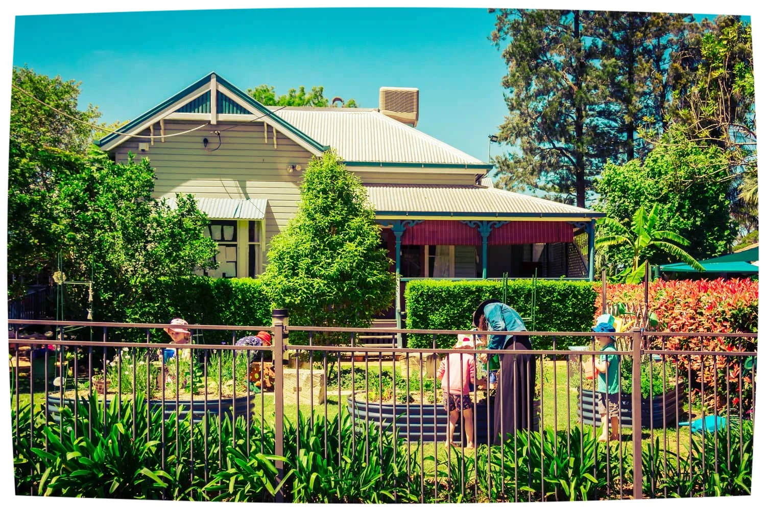 Chiselhurst children with teacher in the front garden.jpg