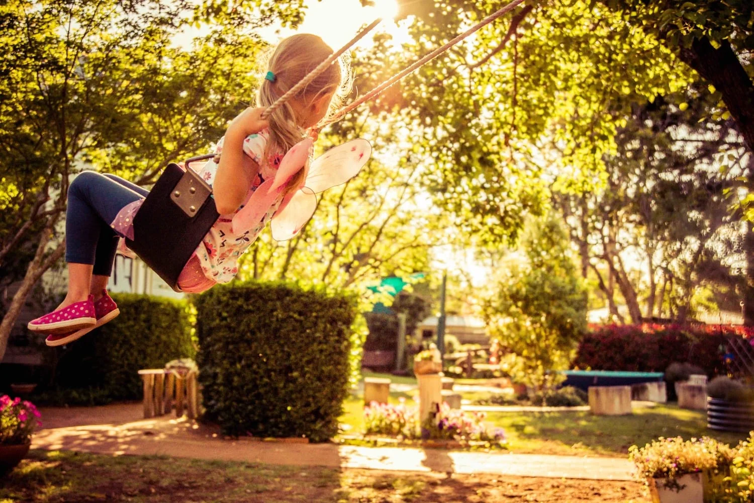 Girl with fairy wings on Chiselhurst swing.jpg