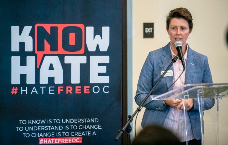  Alison Edwards, chief executive officer of OC Human Relations, speaks as the latest report on hate crimes in Orange County for 2018 is released, on Thursday morning, September 26, 2019, at the Los Olivos Community Center in Irvine. (Photo by Mark Ri