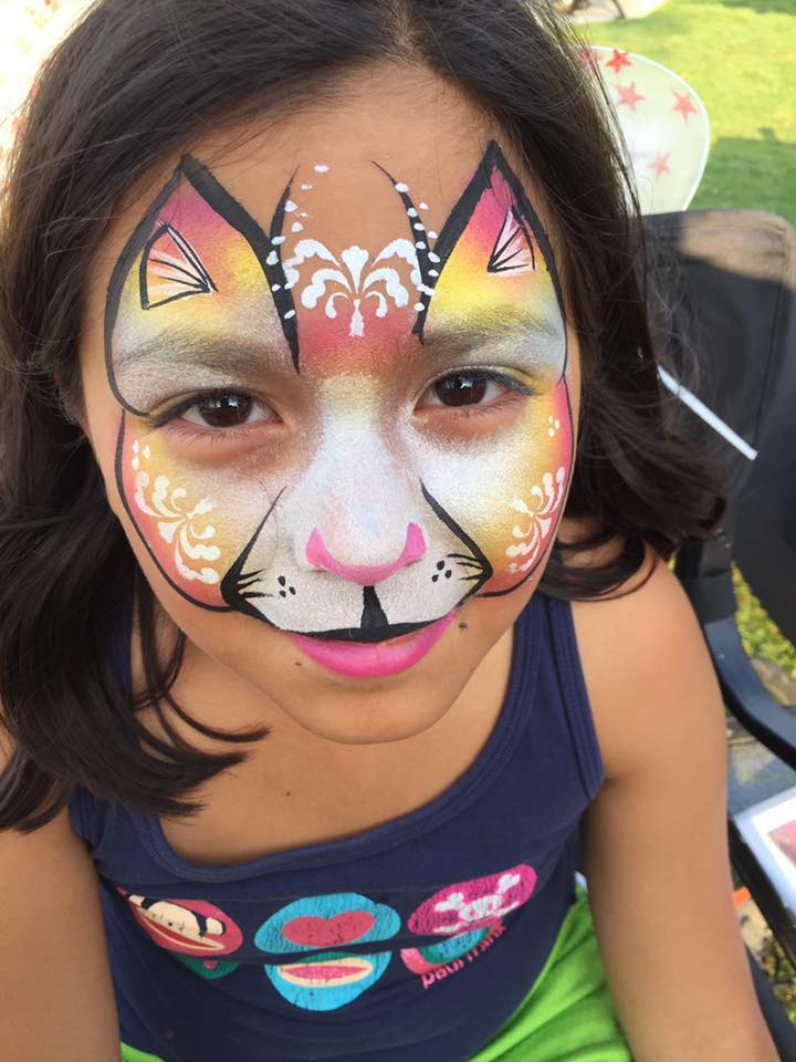 Colored cat with Lifes a Party Facepainting.jpg