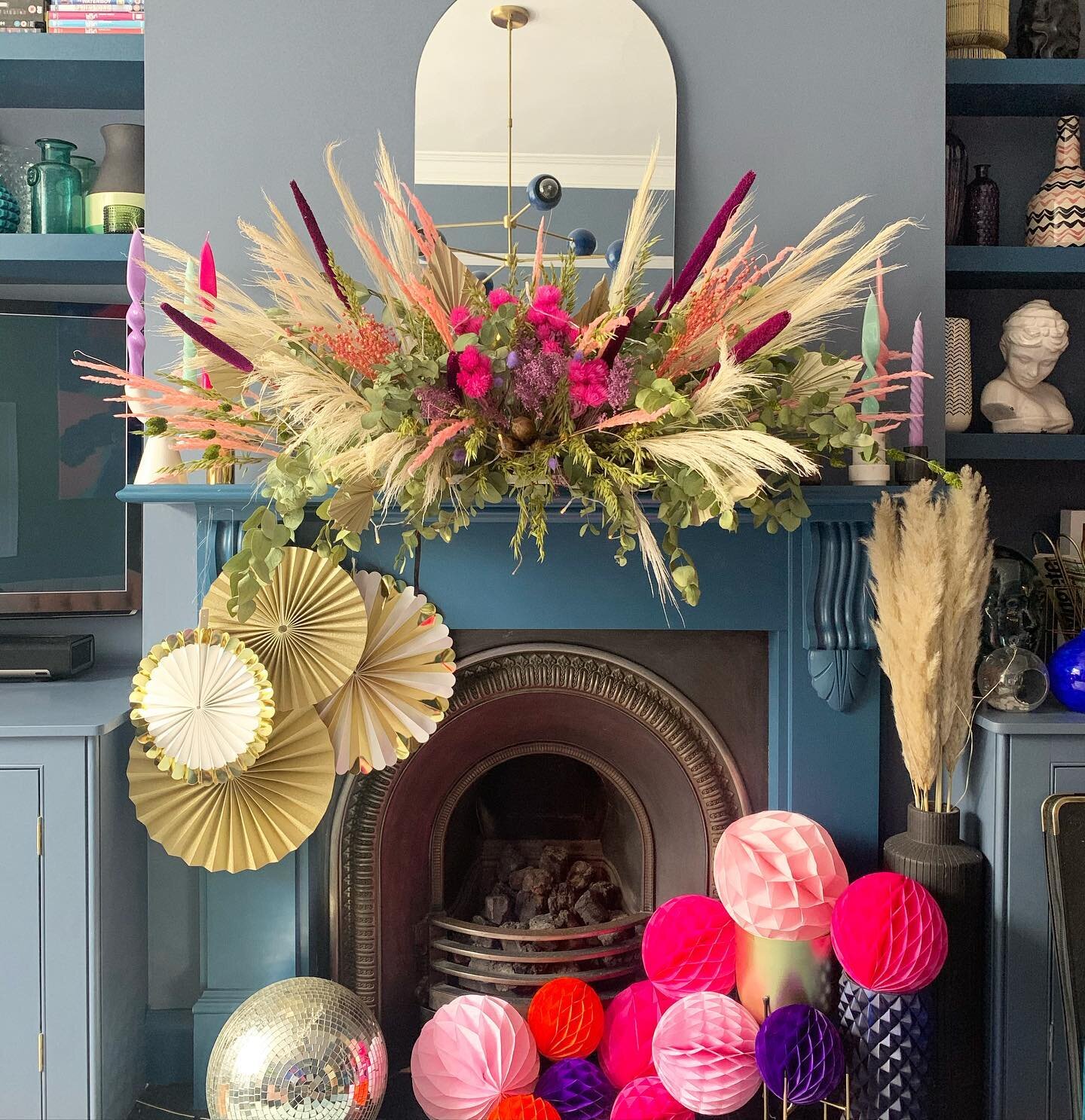 Using up more dried flowers and created this mantel centrepiece. Along with the usual injections of colourful fun with the pom poms and disco ball below.... 2020 made me do it! Did you decorate early this year and have you gone large with decorations