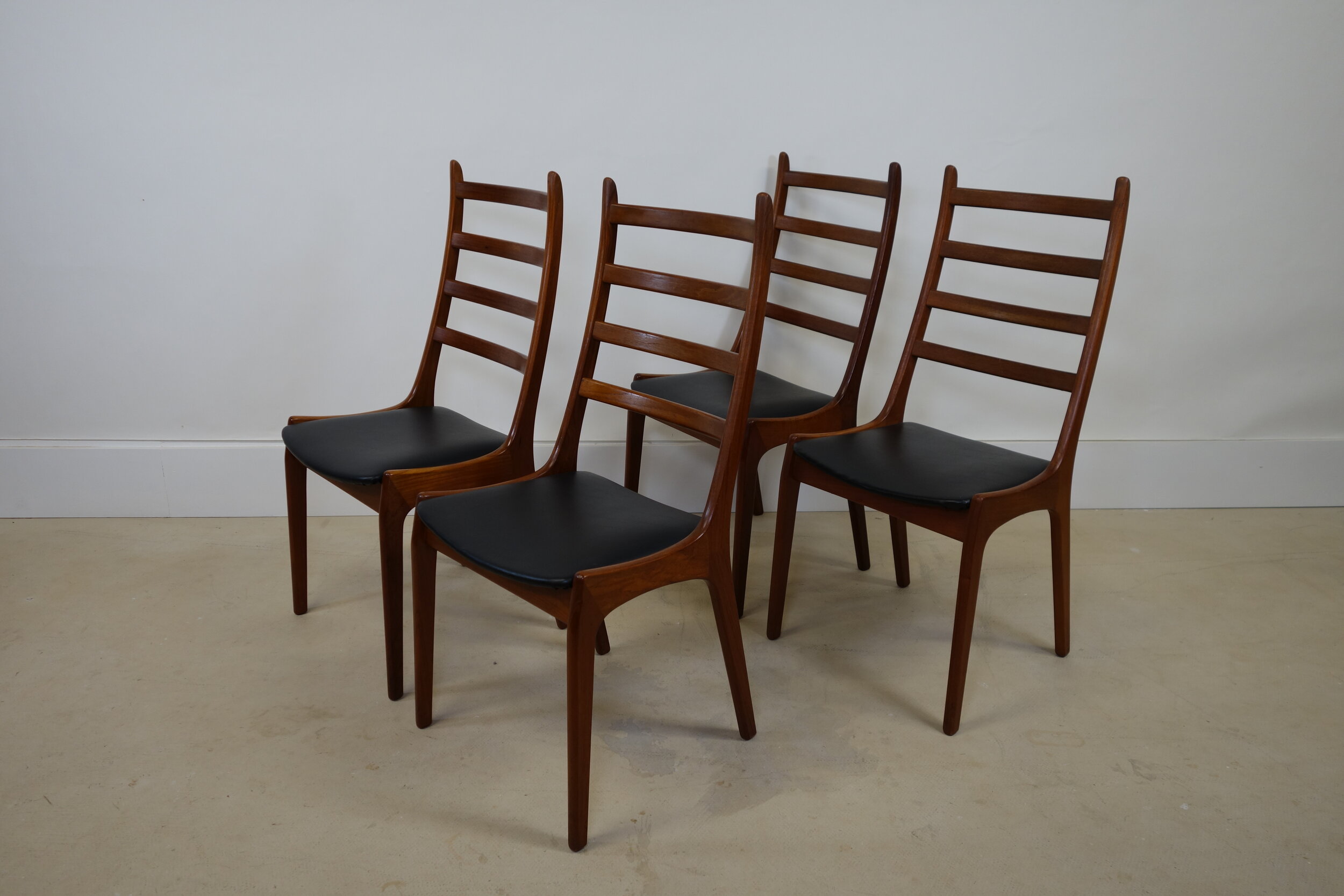Dining chairs by Kai Kristiansen
