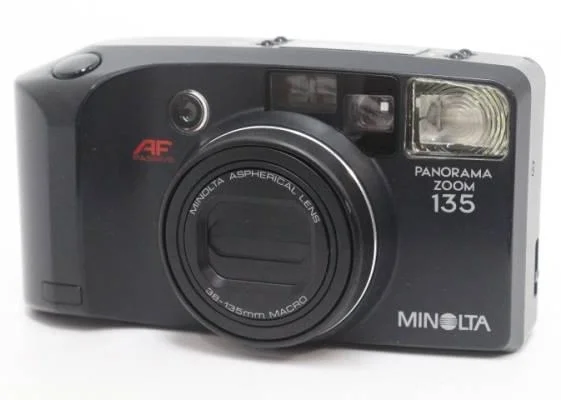 Minolta Panorama Zoom 135 (Battery powered film camera)