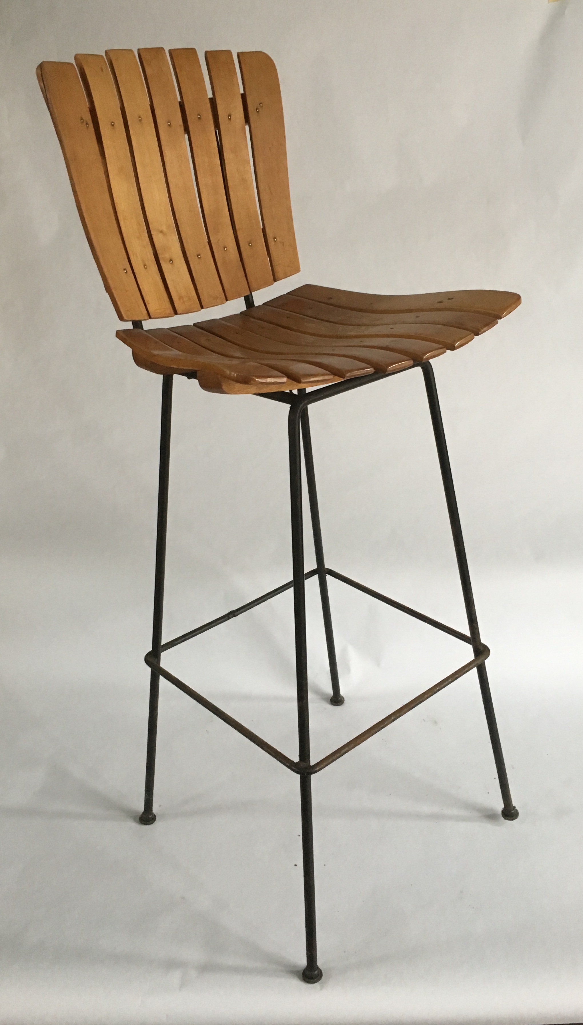 mid century slat wooden bar stool with black metal base  kyla coburn  designs  commercial restaurant hospitality