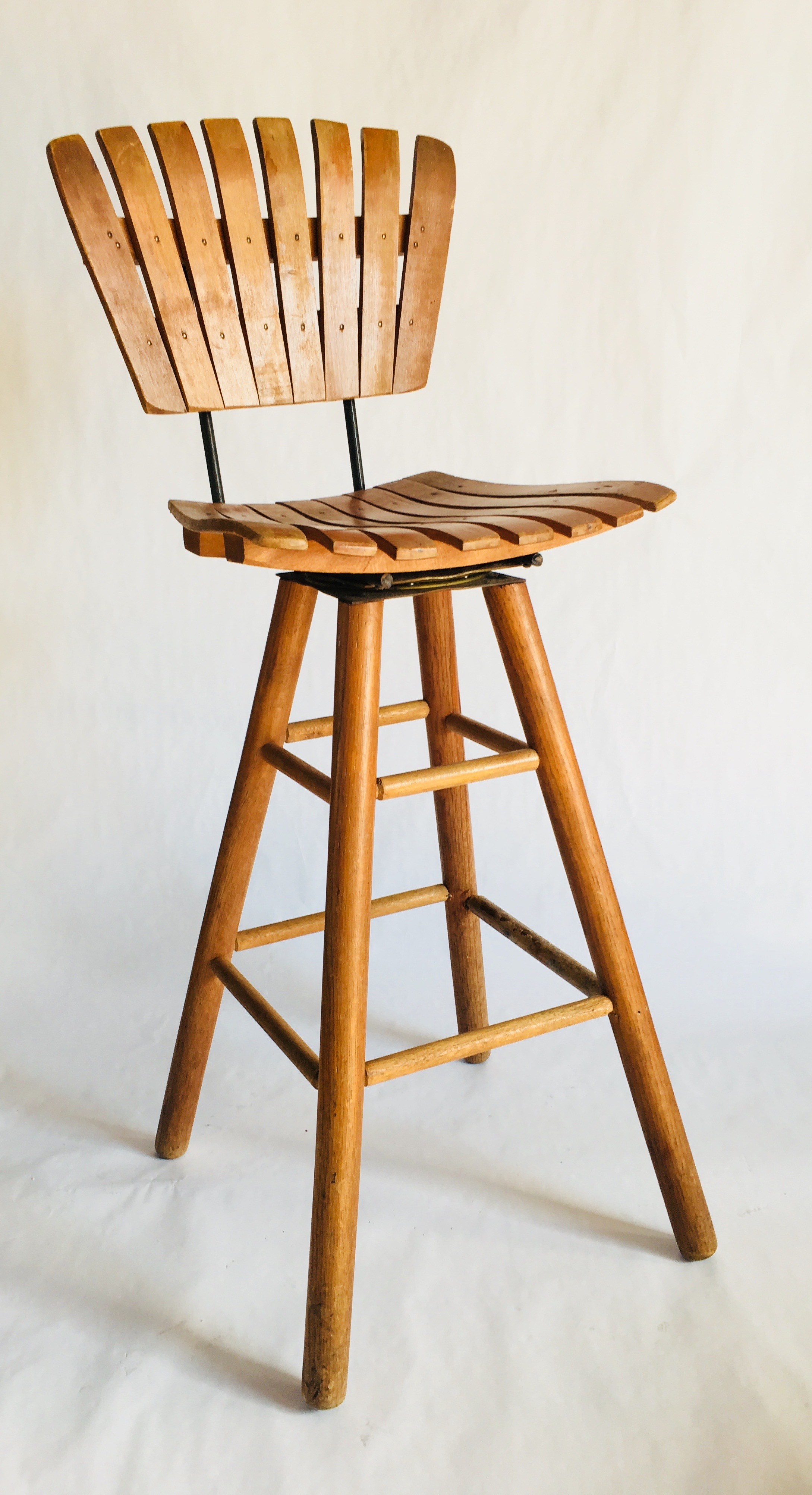 midcentury slat wooden bar stool with wood swivel base  kyla coburn  designs  commercial restaurant hospitality