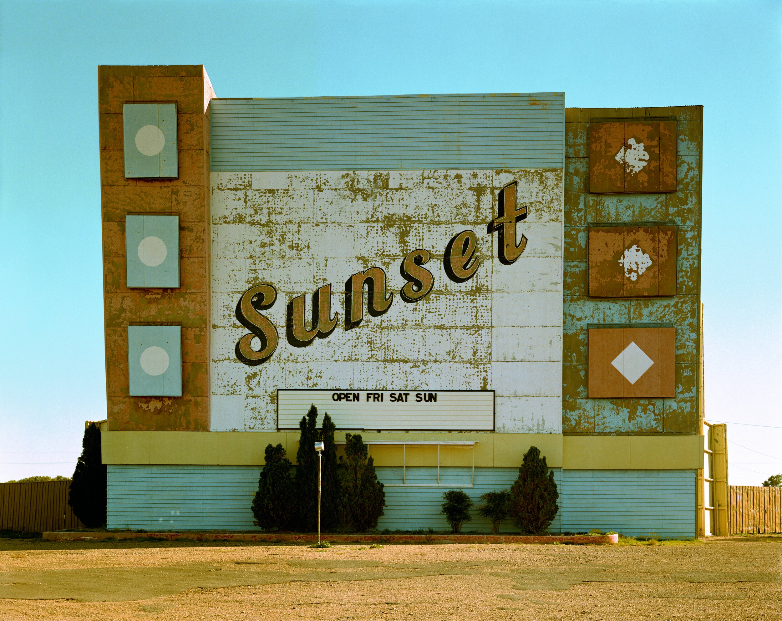   STEPHEN SHORE,  (American, b. 1947),  Sunset Drive In, West 9th Avenue, Amarillo, Texas, &nbsp;1974, C- print, 14 x 16 ½, Gift of Phillip Periman in memory of Wendy Marsh 