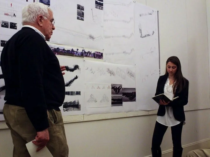 Irina (right) presenting to Peter Eisenman (left) during graduate school. Photo courtesy of Cornell University