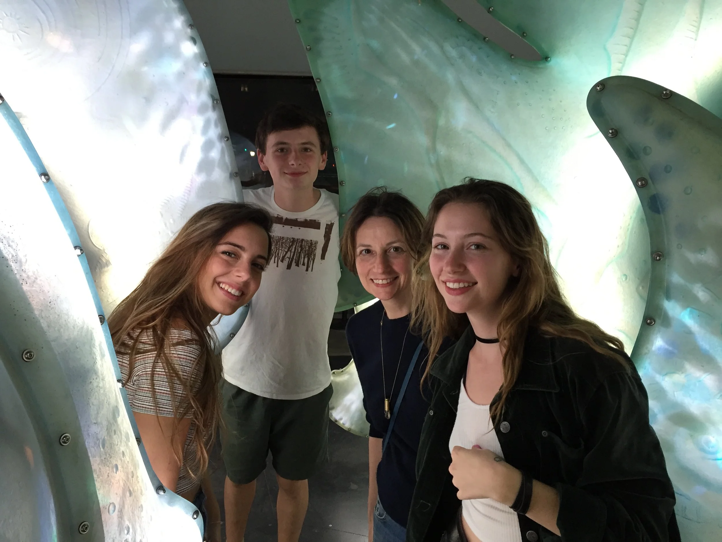 Sara with her kids (and a cousin!) today.