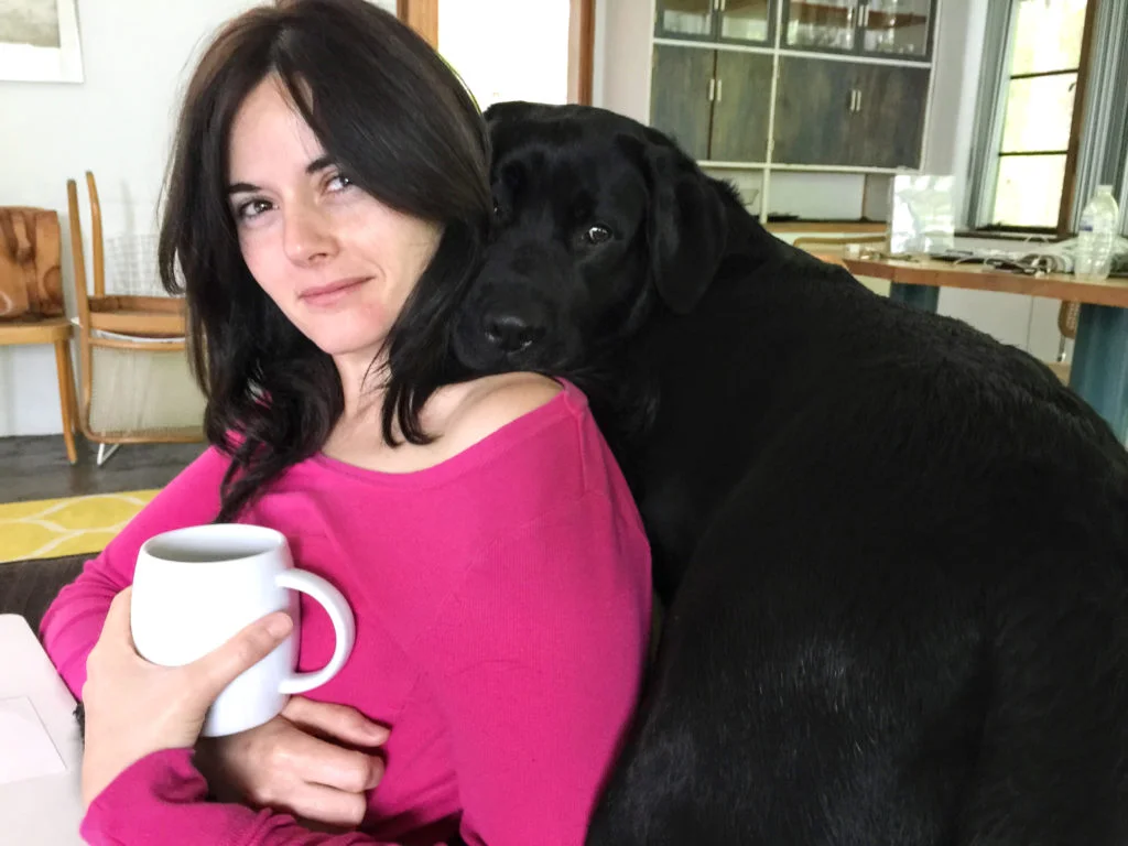 Sou, Lorena and Inaqui’s 6 yr old black lab, helping Lorena prepare for classes. Ithaca, 2015