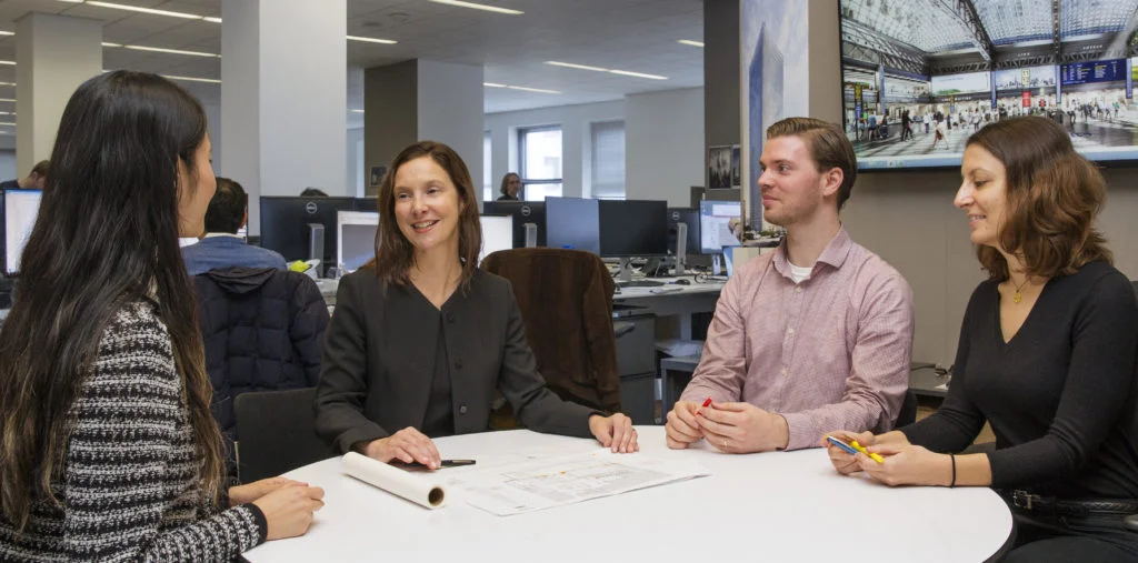 Nicole with junior colleagues. Courtesy of SOM.