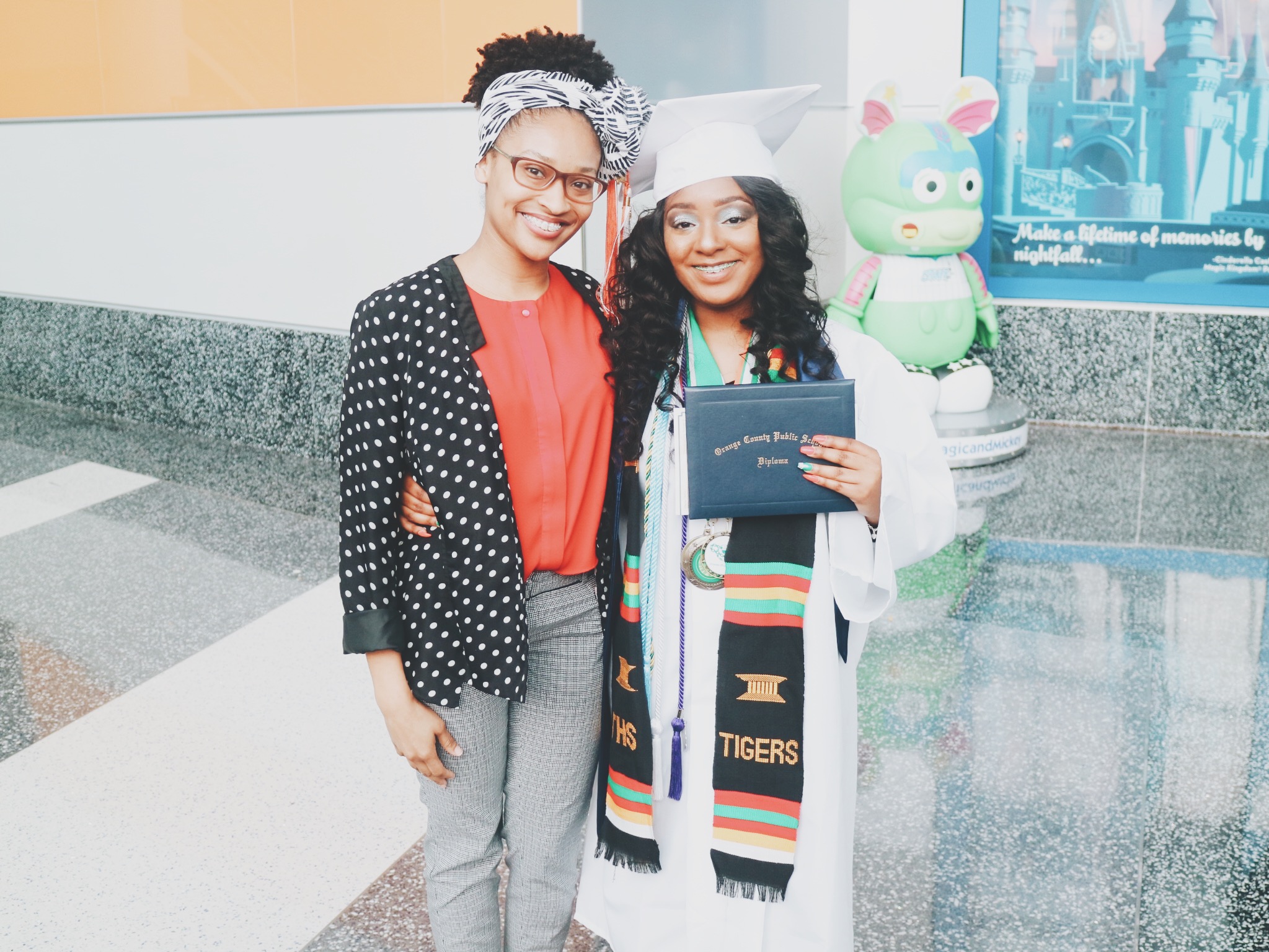Elease with mentee, Mashayla Scott, at her graduation from Elease's High School Alma Mater, Jones High School. Mashayla graduated exactly ten years after Elease.