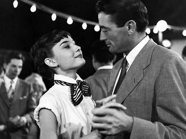 Still from Roman Holiday , Audrey Hepburn and Gregory Peck.