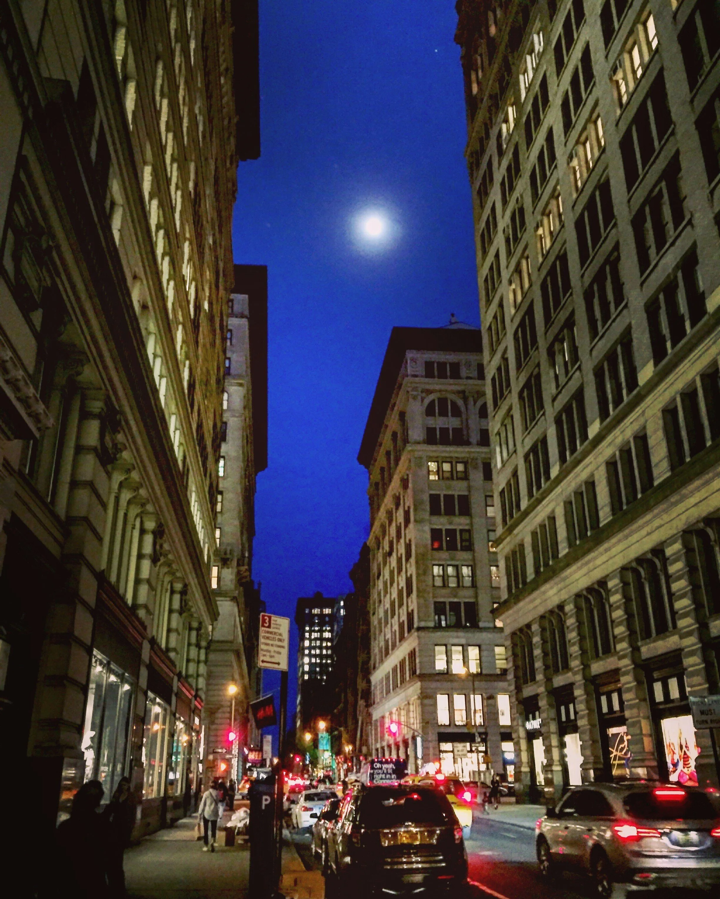 Nighttime commute through the Flatiron District.