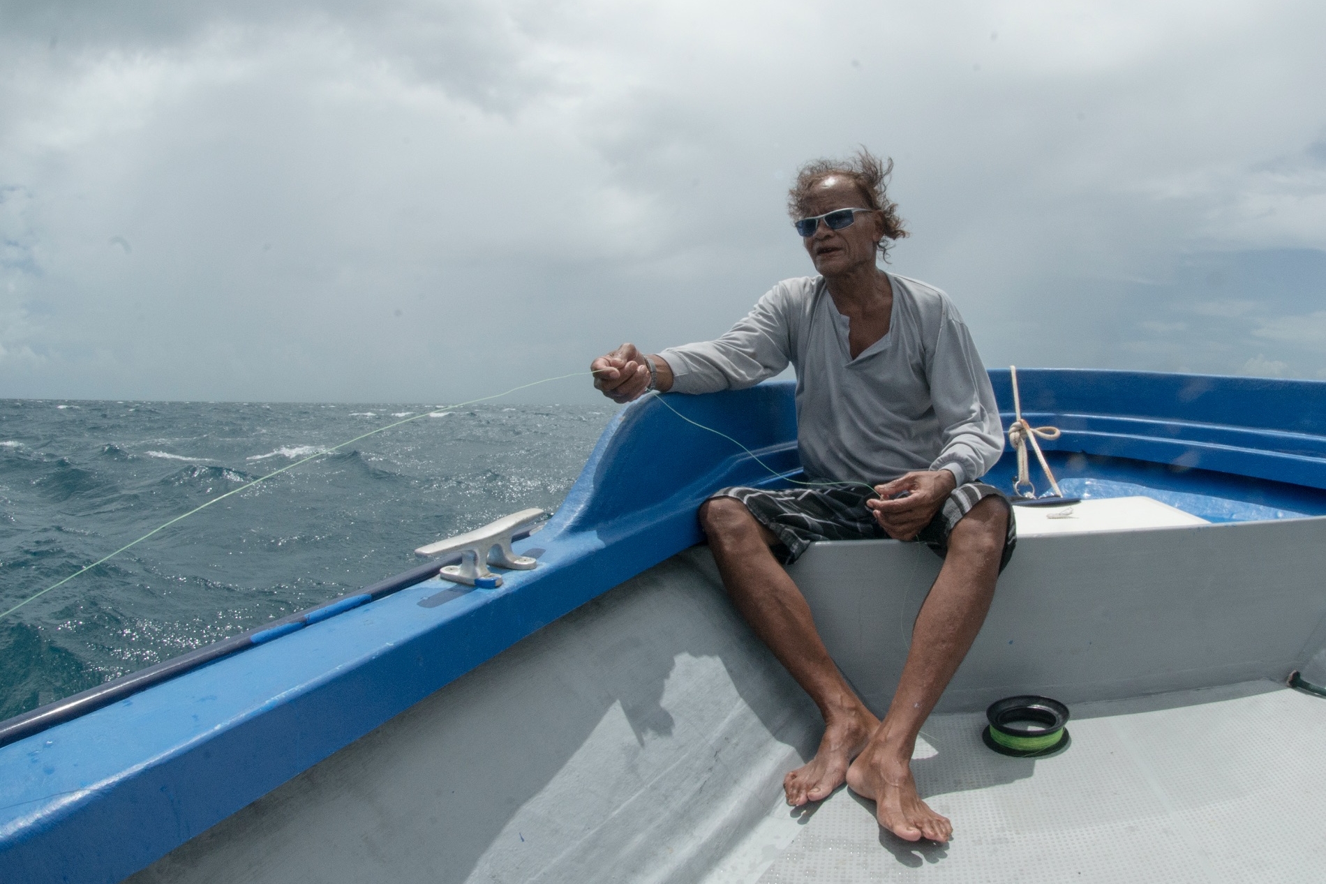 FISHERMAN, PALAU CREDIT: THE OCEAN AGENCY / coral reef image bank