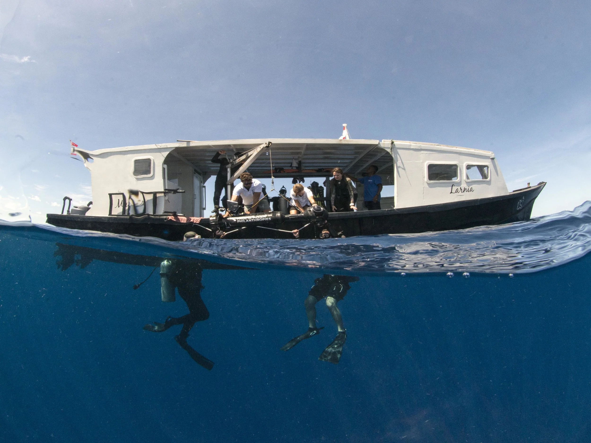 02 - scientists lower the camera before a survey CREDIT: The Ocean Agency / paul g. allen philanthropies