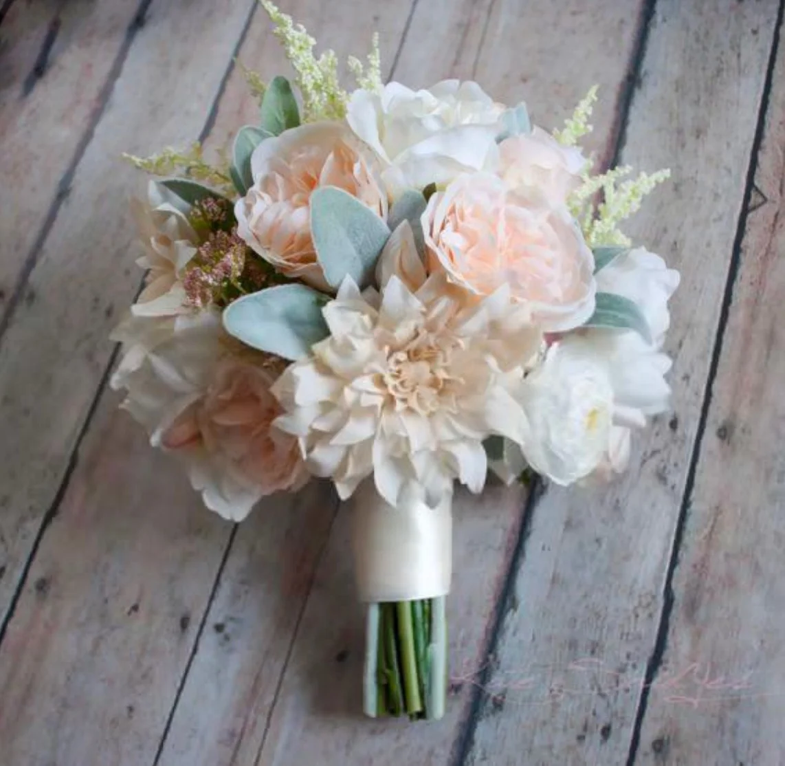 Our inspiration for bridal and bridesmaids' bouquets, down to the white double-faced satin wrapping the stems.