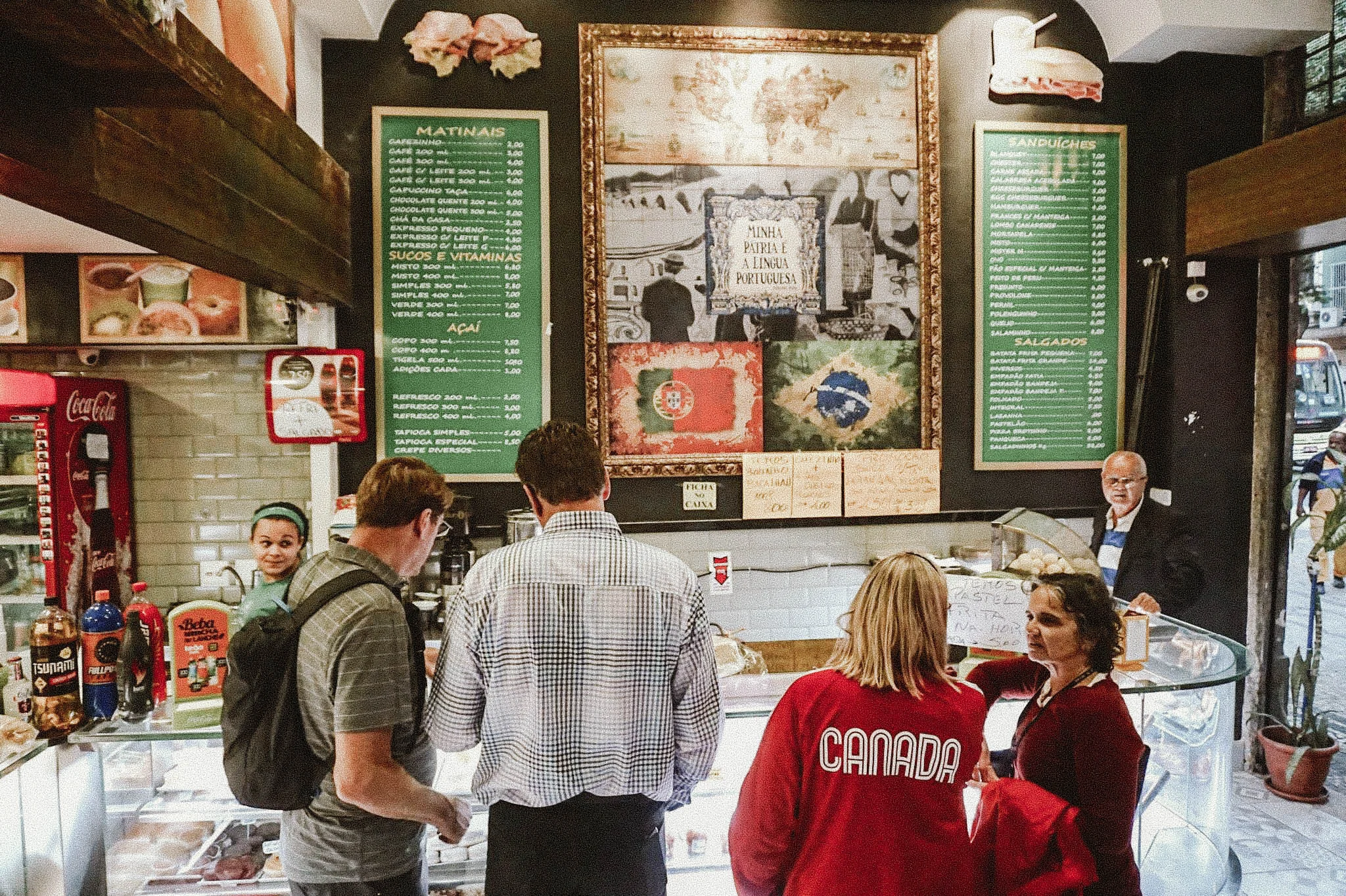 Strolling through different markets in the Downtown District; stopping for açai, coffee, and a treat.