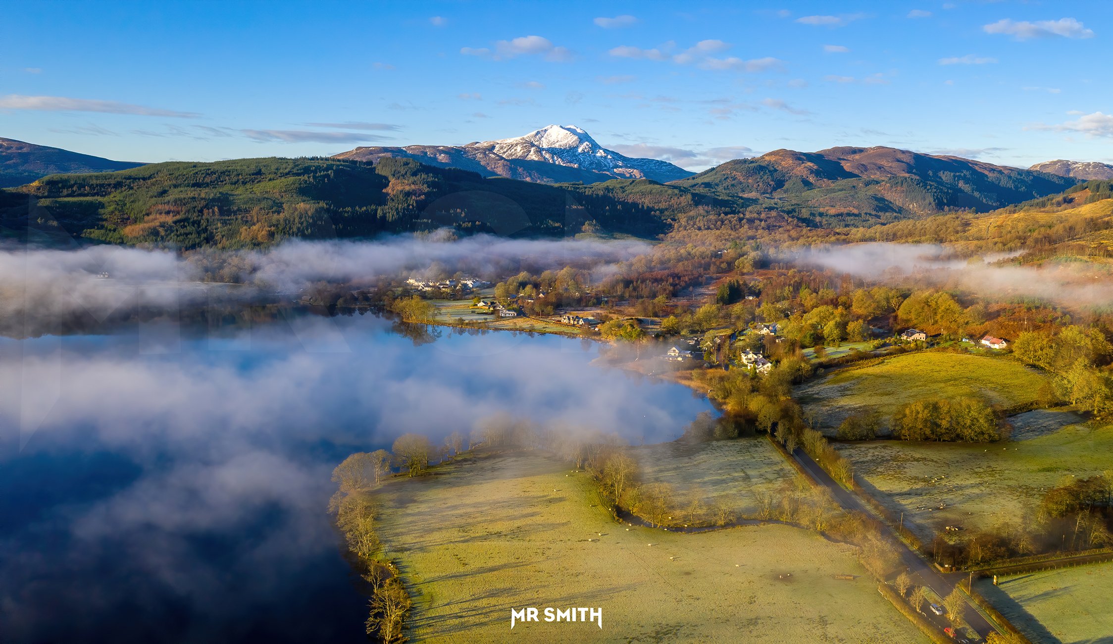 Aerial view of Loch Ard with Ben Lomond on the horizon