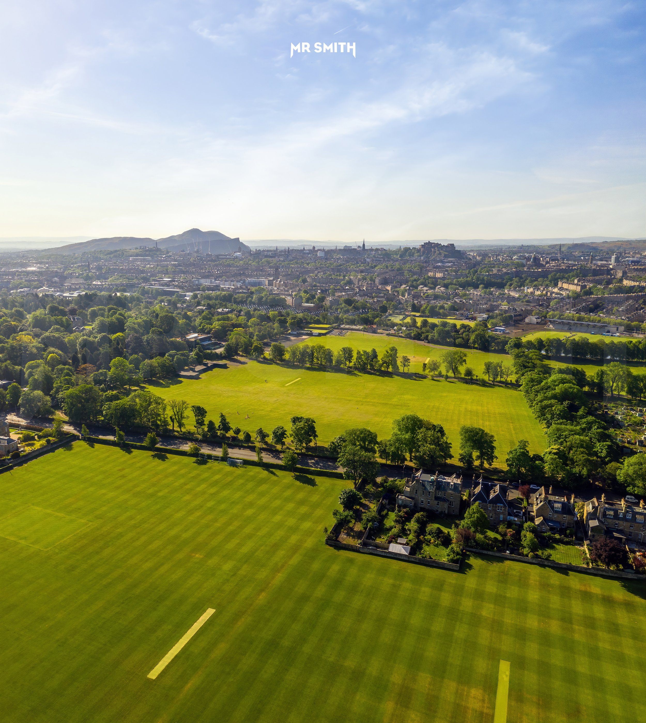 Aerial view of Edinburgh across playing fields