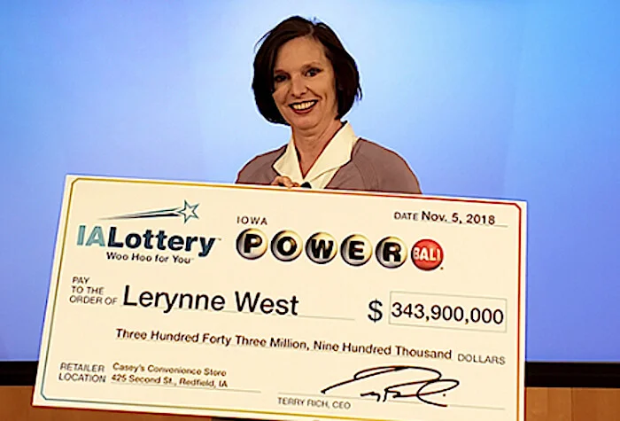 First pictures of Iowa's $343.9 million Powerball winner as she claims her prize