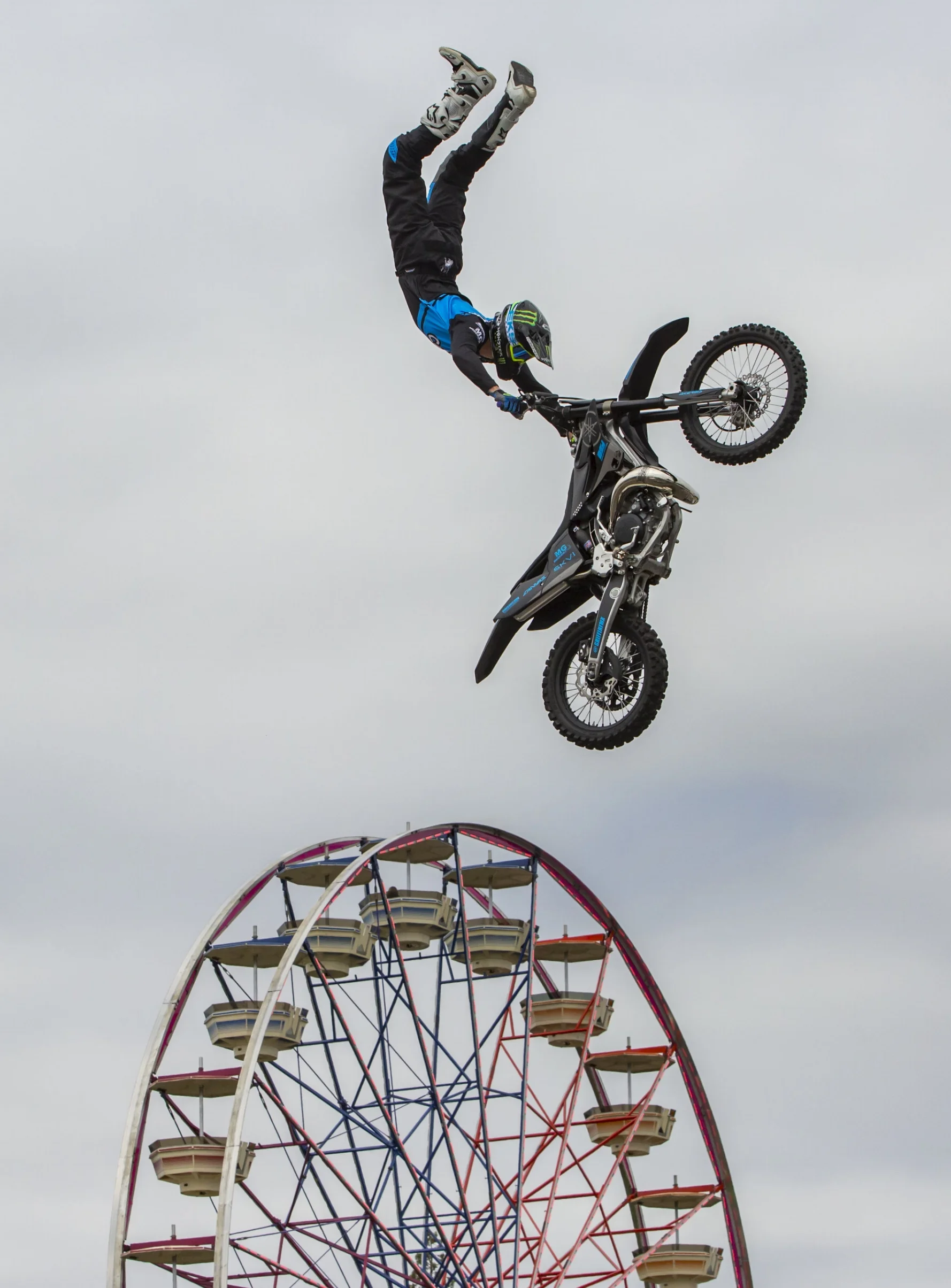 Jeff Griffin performs during the Freestyle Motocross show at the Lane County Fair on July 19, 2018. The Lane County Fair continues Thursday through Saturday 11am to 11pm and Sunday 11am to 11pm. [Ben Lonergan/The Register Guard] - registerguard.com 