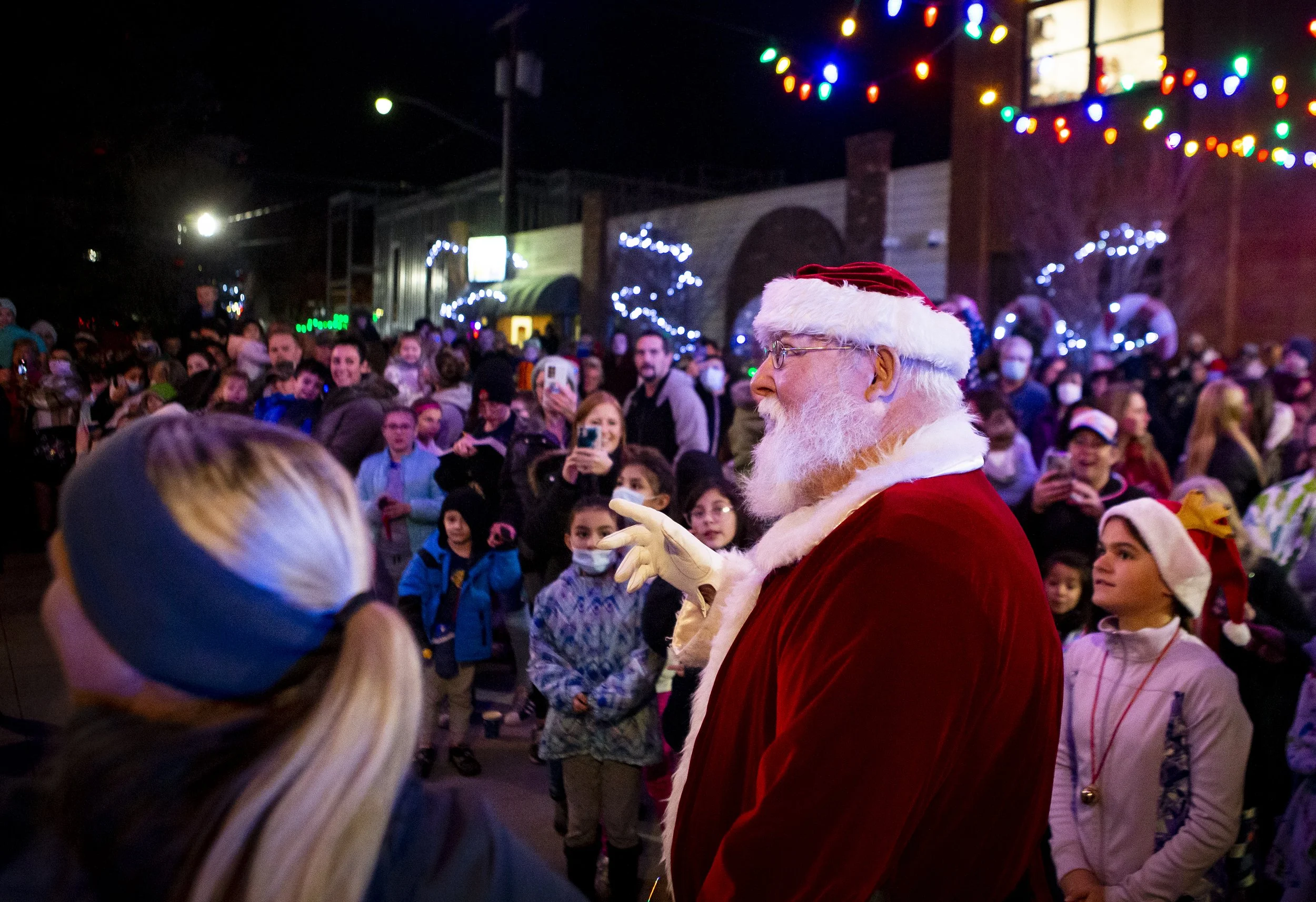  Santa Claus waves as he passes through the crowd Thursday, Dec. 2, 2021, at the city of Hermiston’s Christmas tree lighting in downtown Hermiston. John Perkins, who plays the role of Saint Nick, was diagnosed with stage four pancreatic cancer earlie