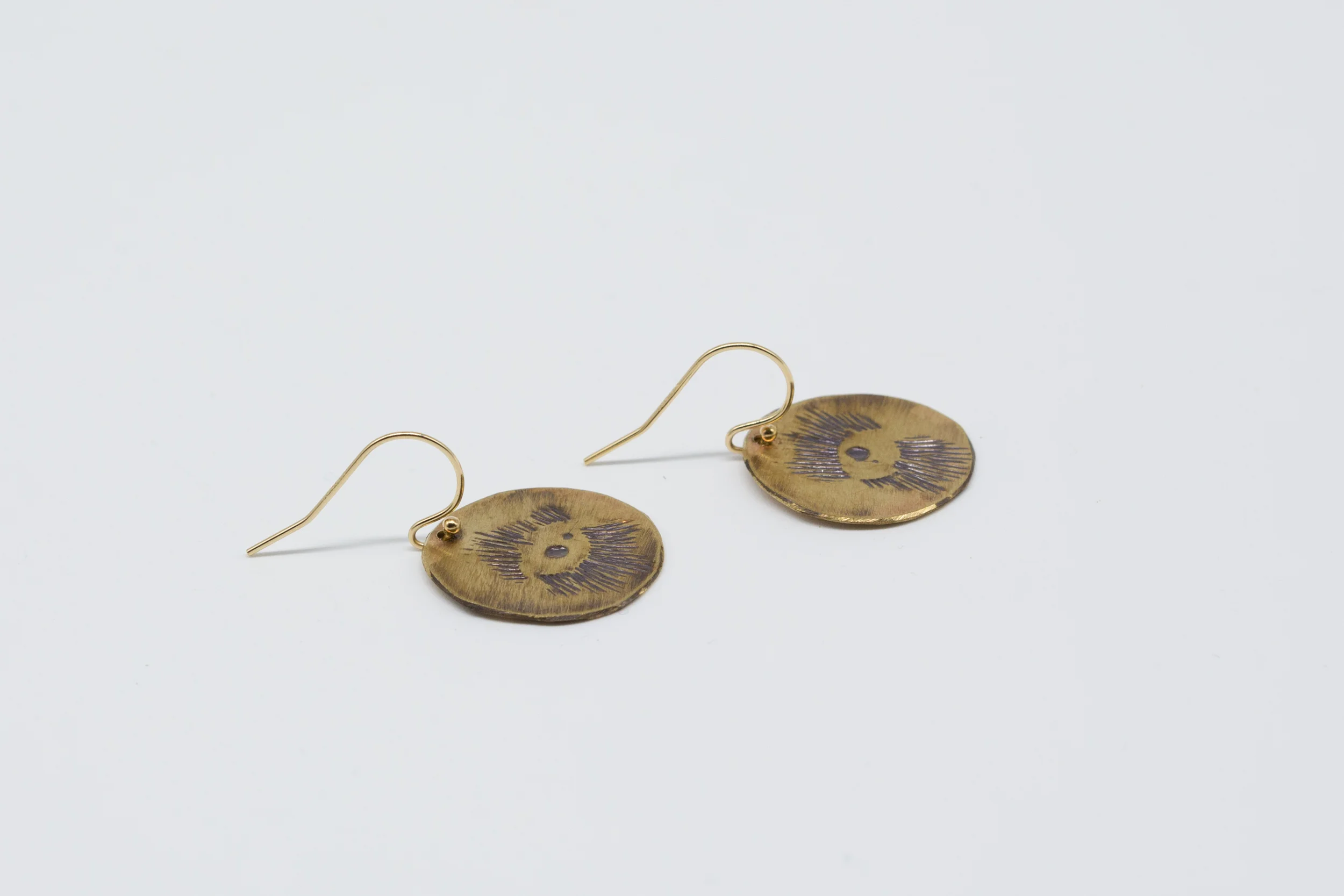 all seeing earrings side.jpg