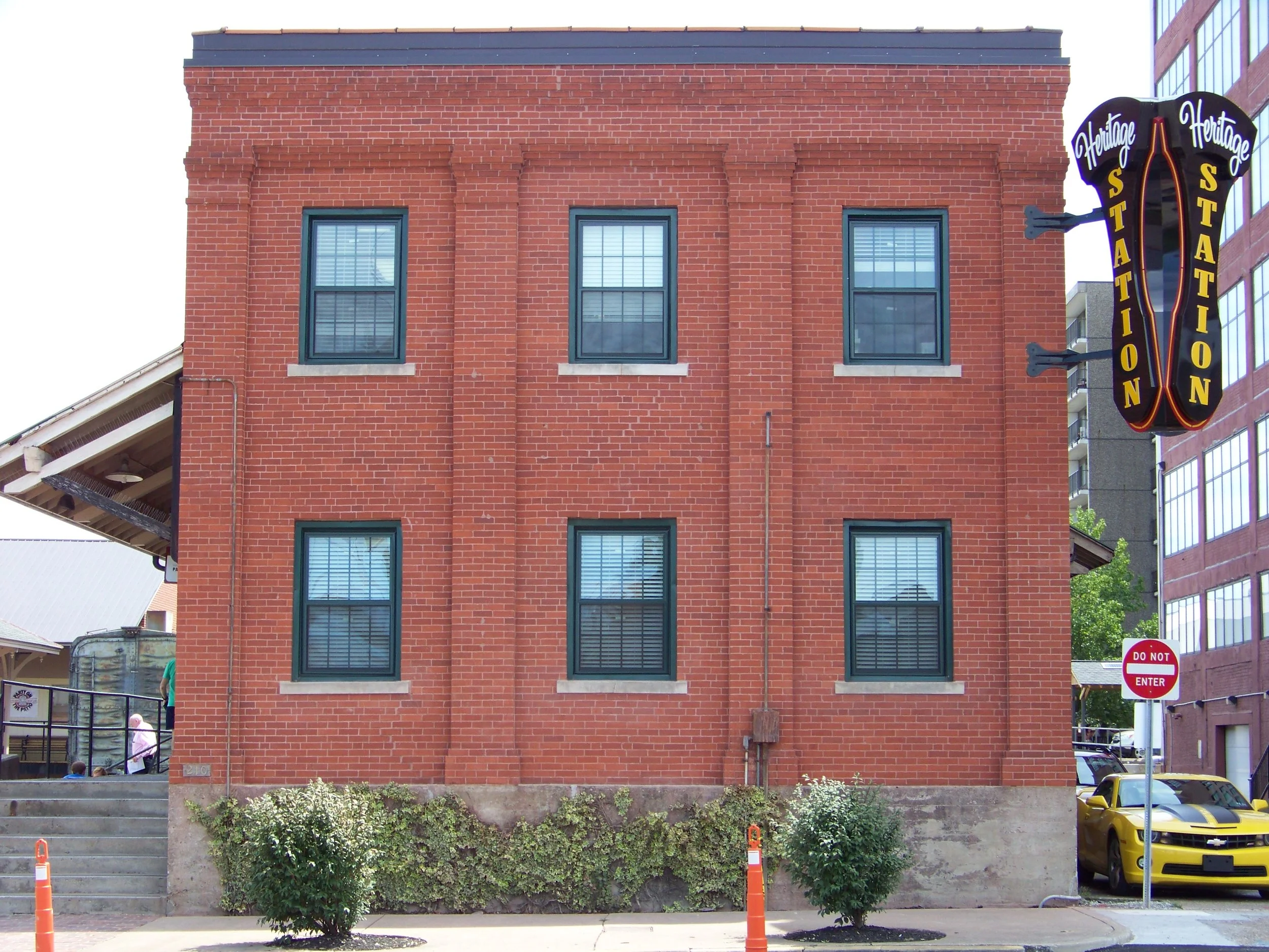 Tuck point and seal park board office wall at Heritage station
