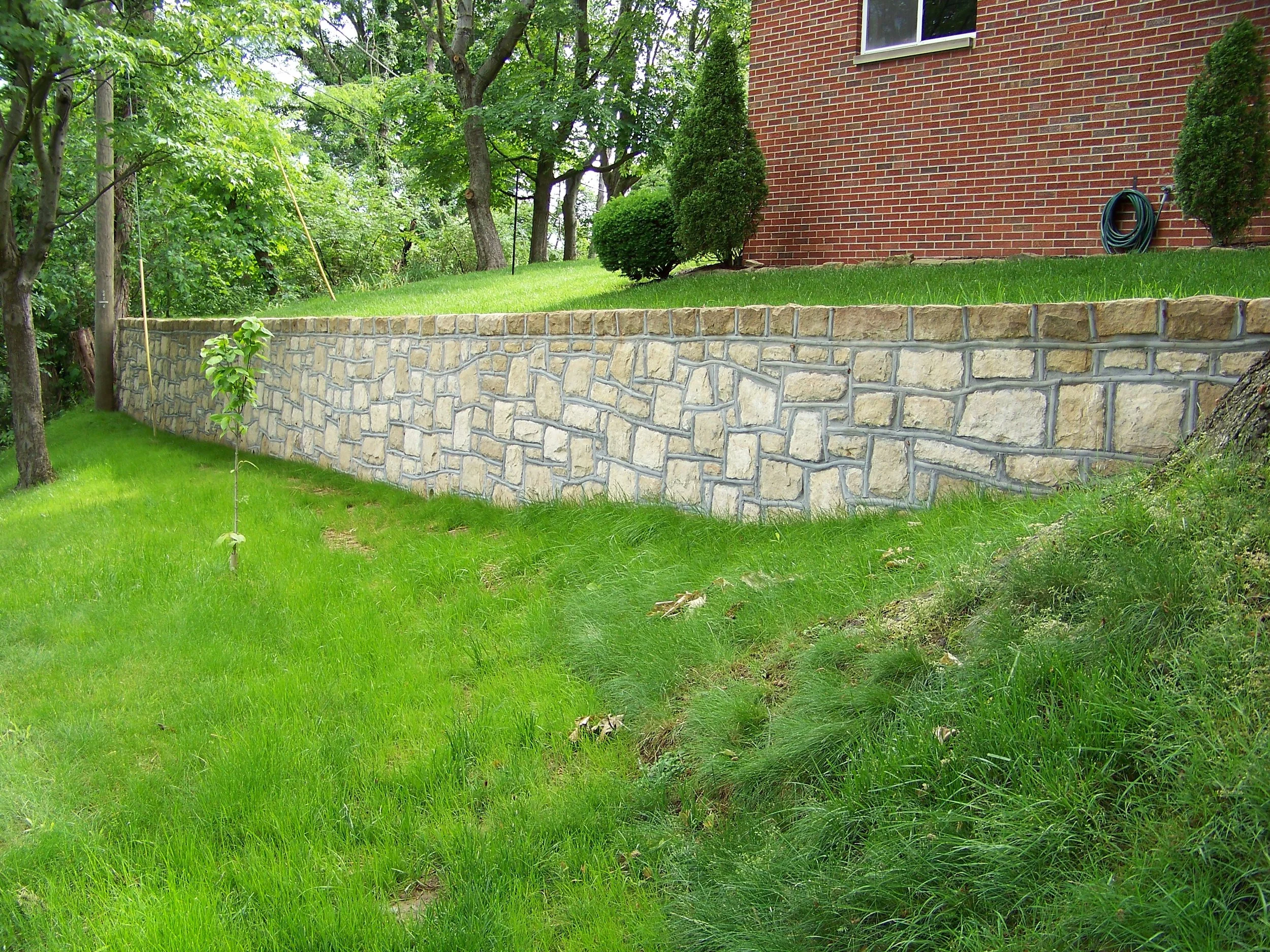 Stone wall rebuilt