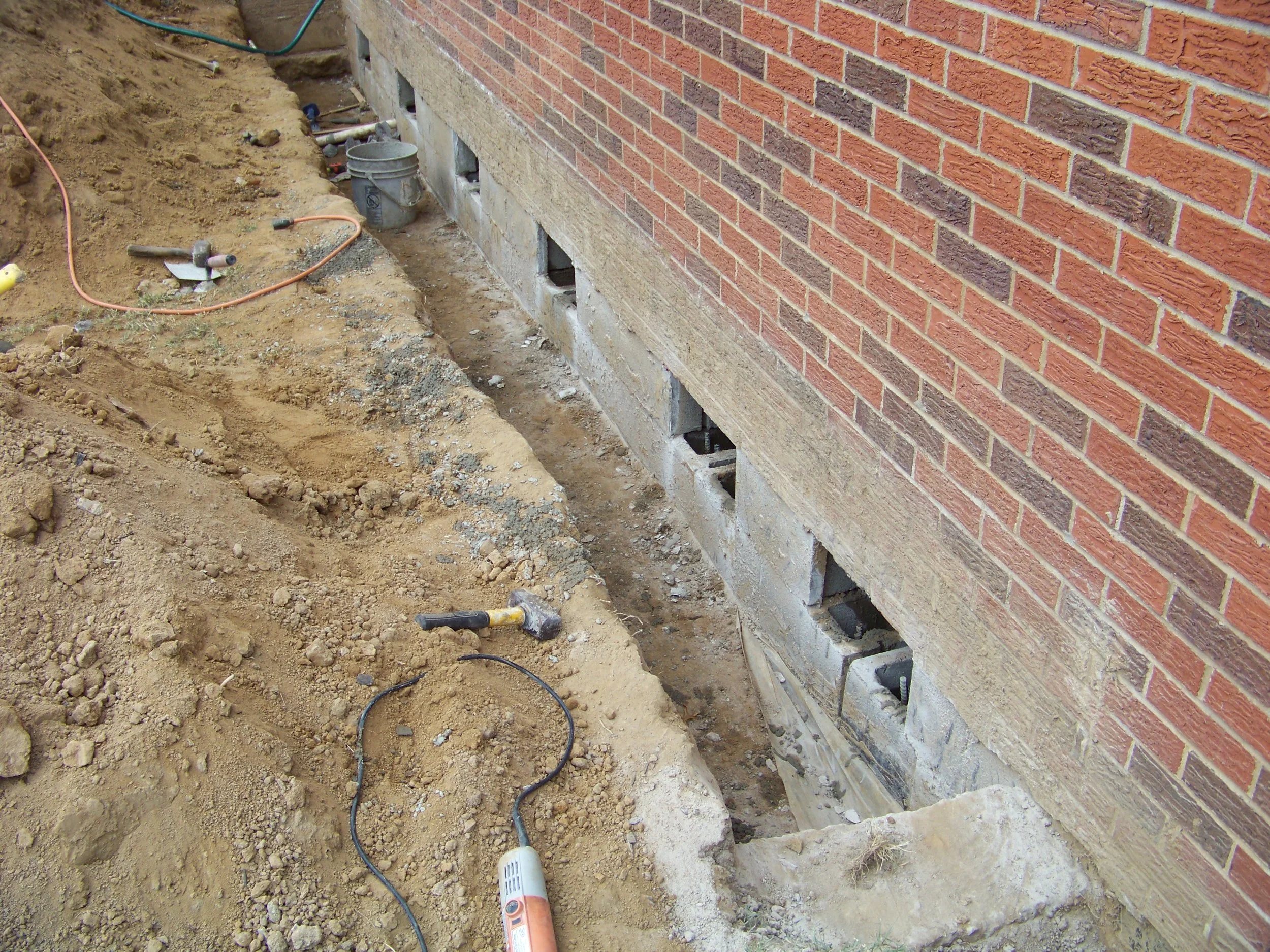 Retrofit basement wall