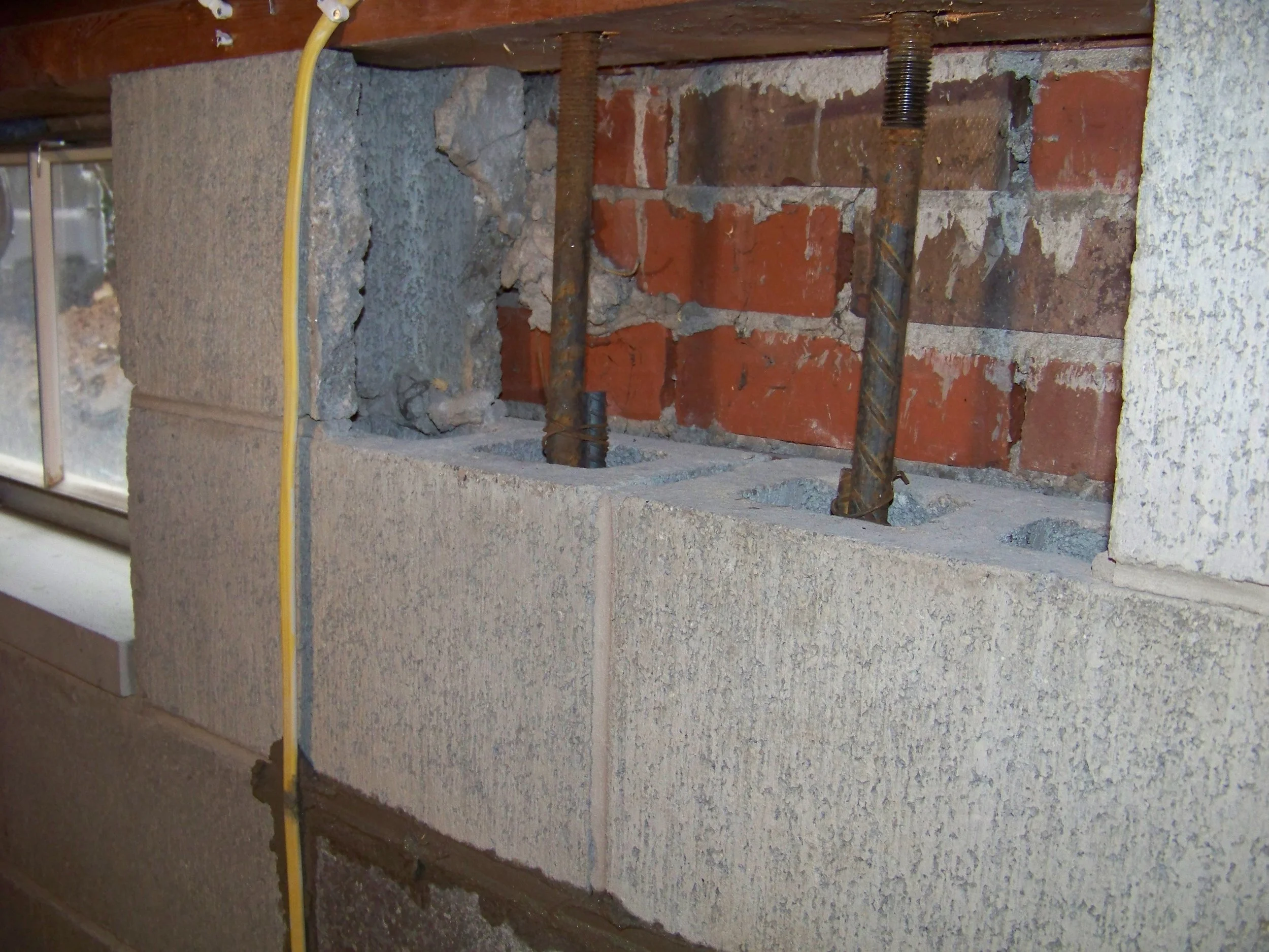 Retrofit tie rebar to top plate foundation repair Huntington WV
