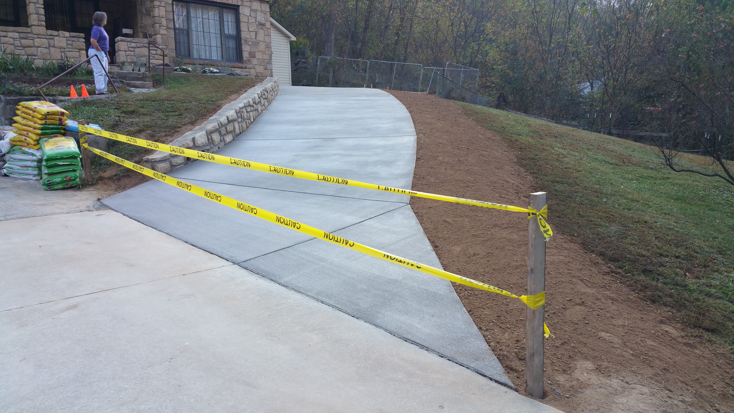 Concrete driveway and retaining wall