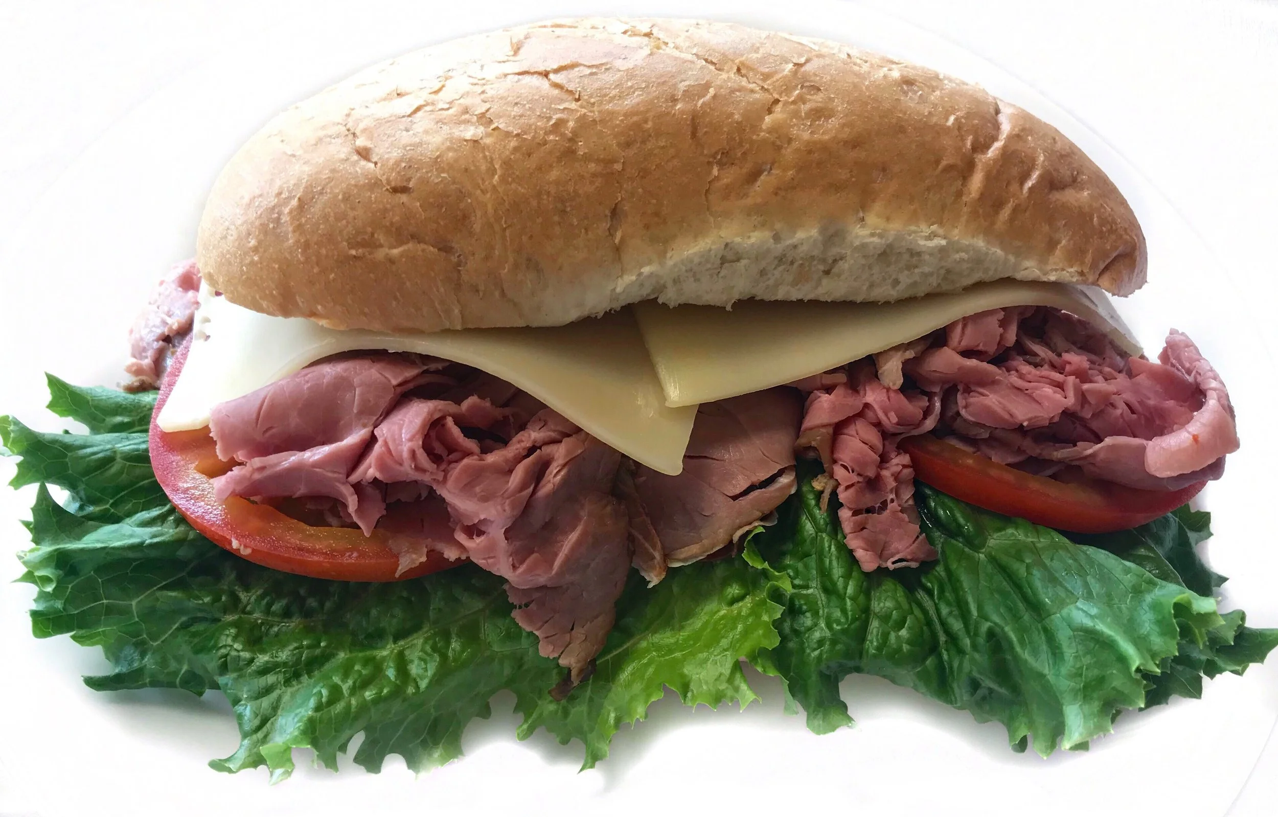 Roast Beef Sandwich Roast Beef, Swiss Cheese, Lettuce, Tomato on Hoagie Roll