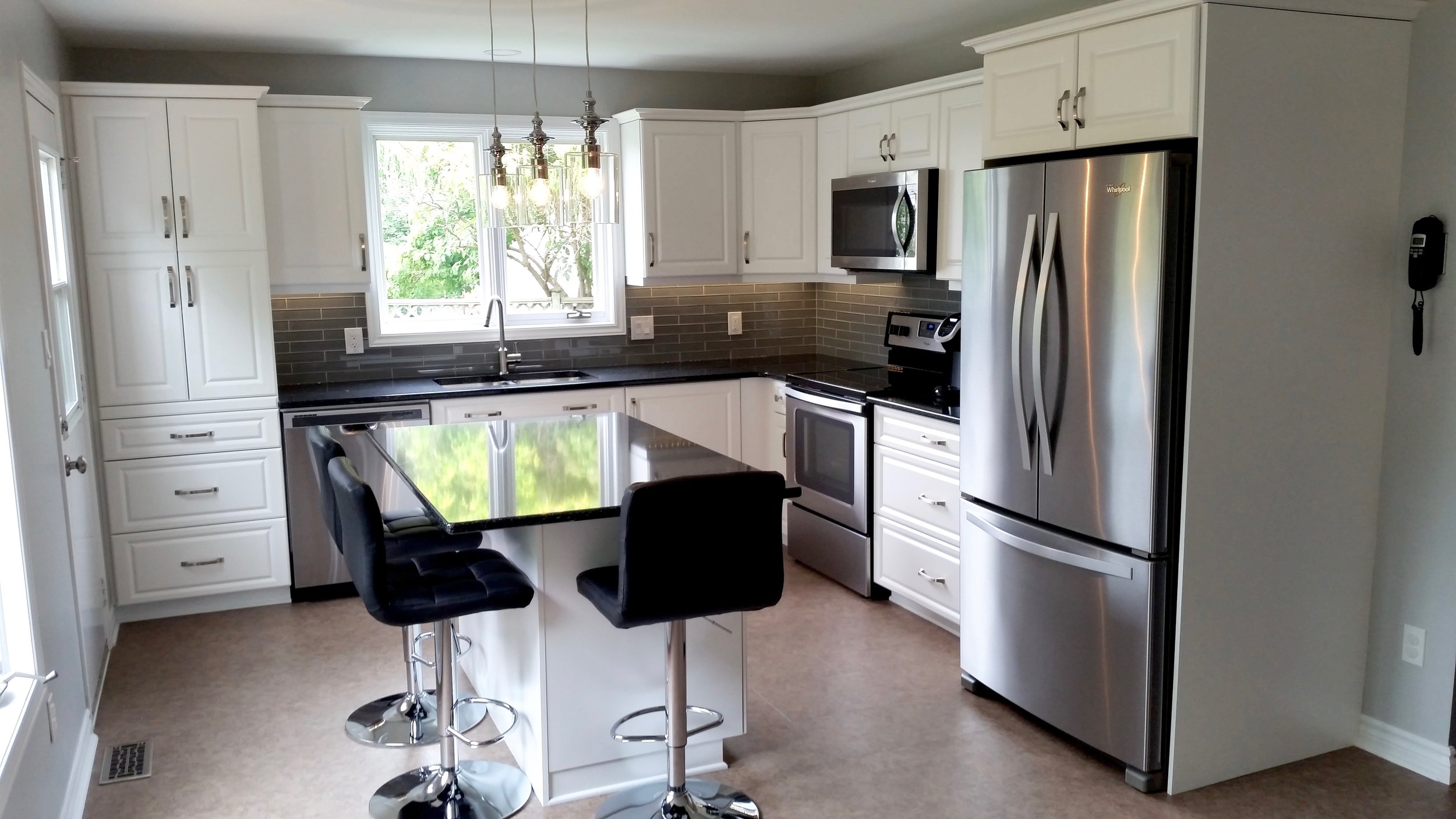 Complete kitchen remodel including floor, cabinets, countertops, and backsplash