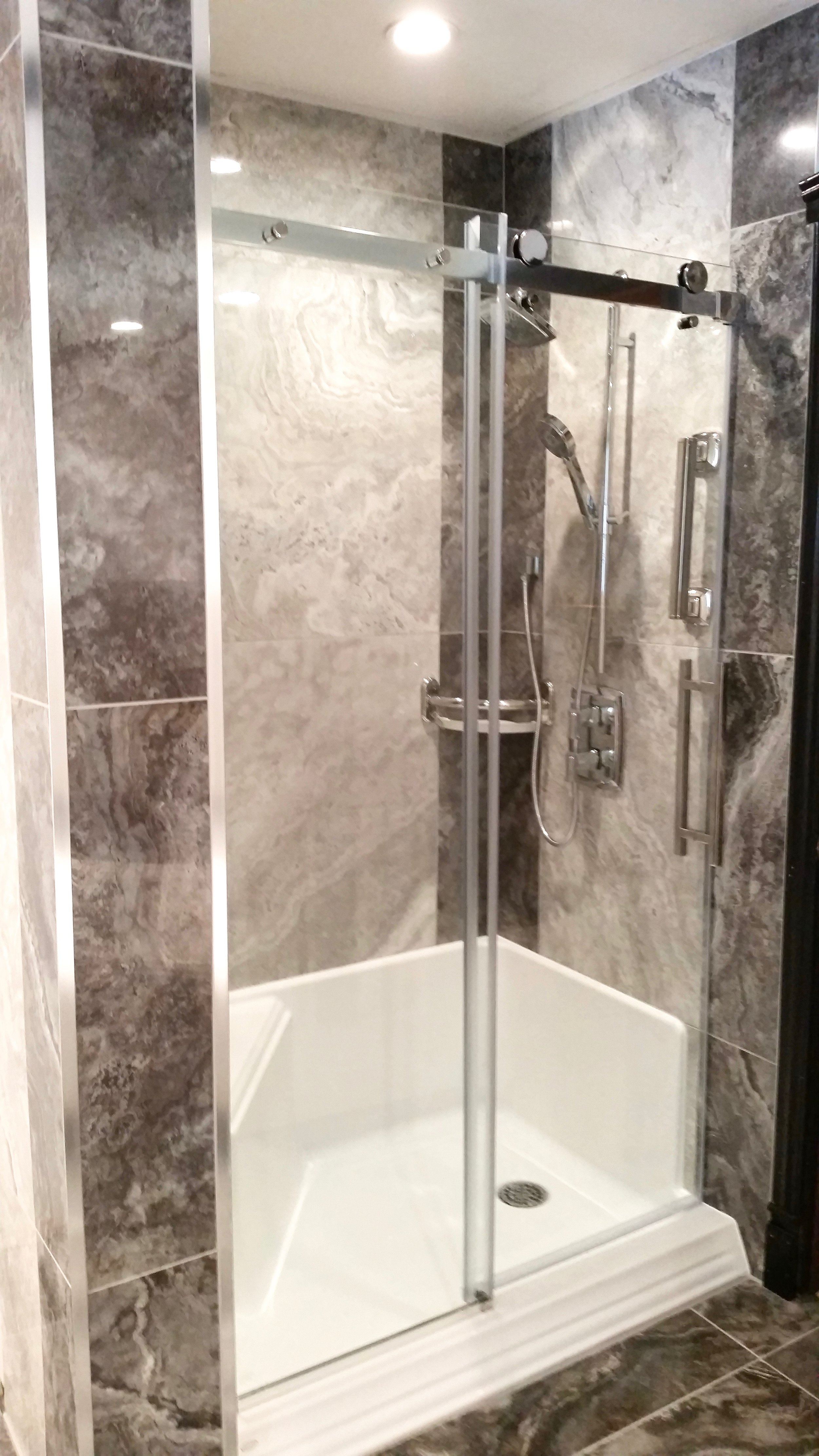 Shower stall with custom glass