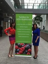 Sue Lucia N4NN at MARS with banner.jpg