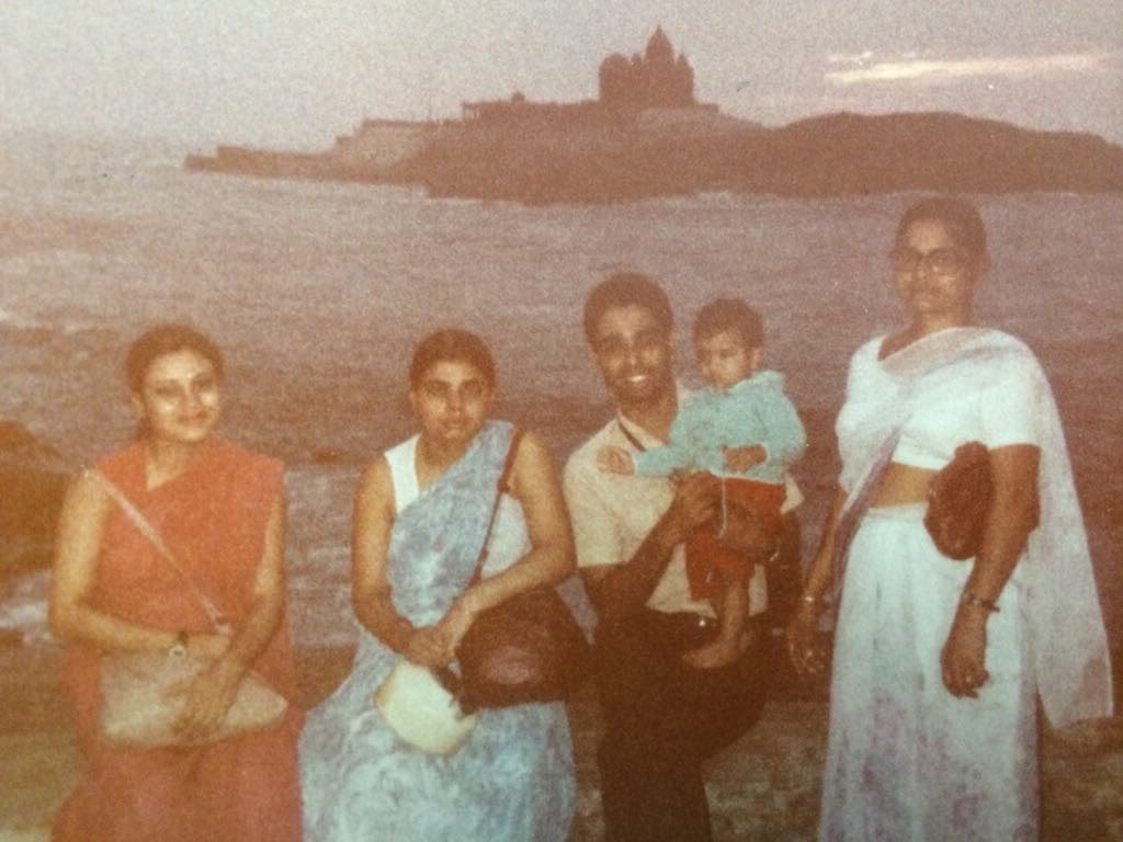 My dad, his sisters, my oldest cousin as a baby, and my grandmother in Kanyakumari