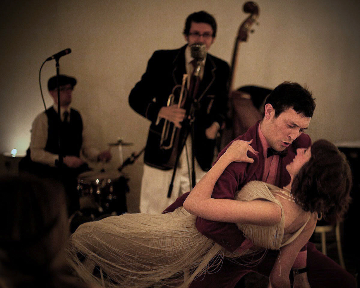 Couple dancing to jazz band the Shirt Tail Stompers