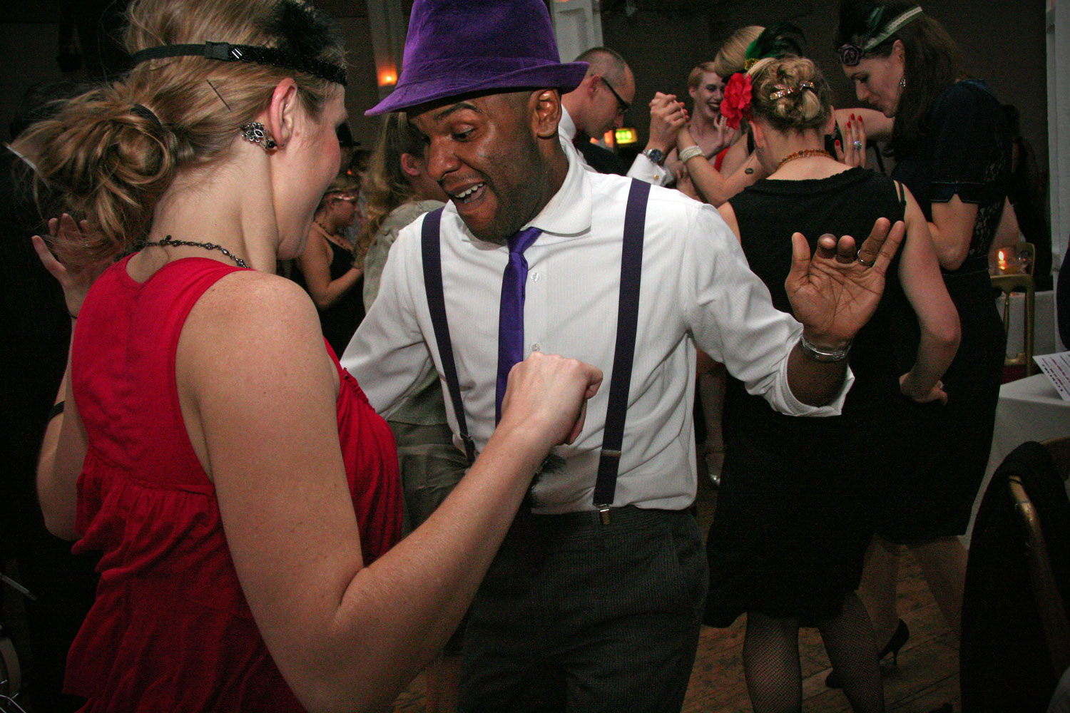 Couple dancing wildly at the Candlelight Club